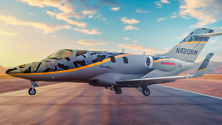 A render of a HondaJet on an airport apron.