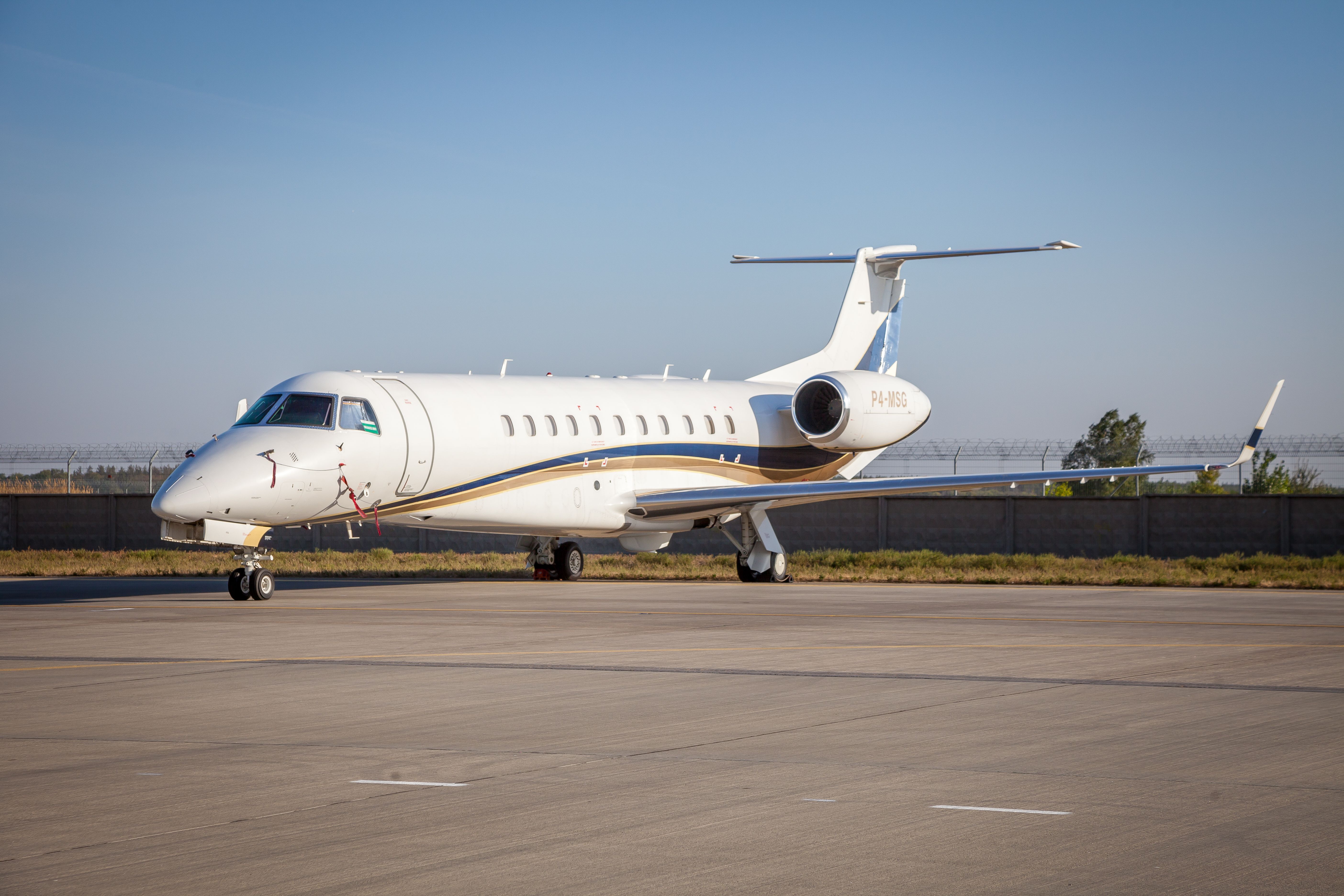 An Embraer Legacy 600 on an airport apron.