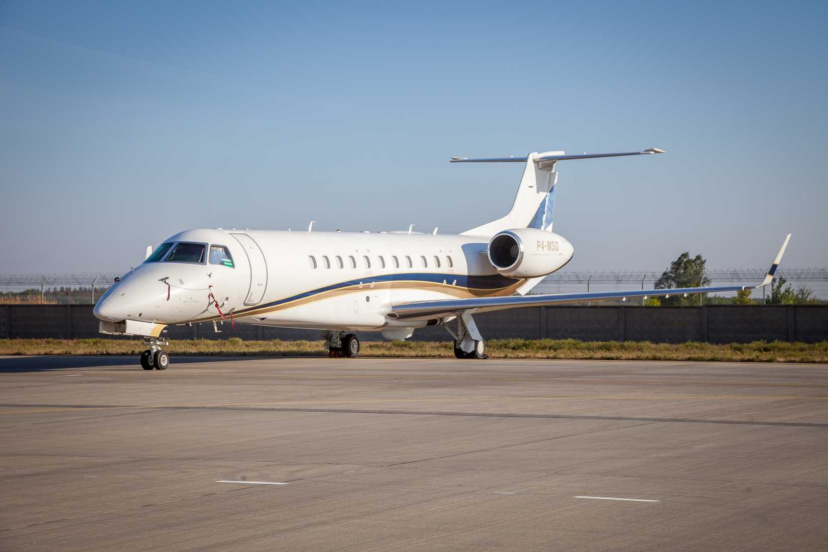 An Embraer Legacy 600 on an airport apron.