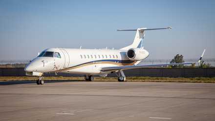 An Embraer Legacy 600 on an airport apron.
