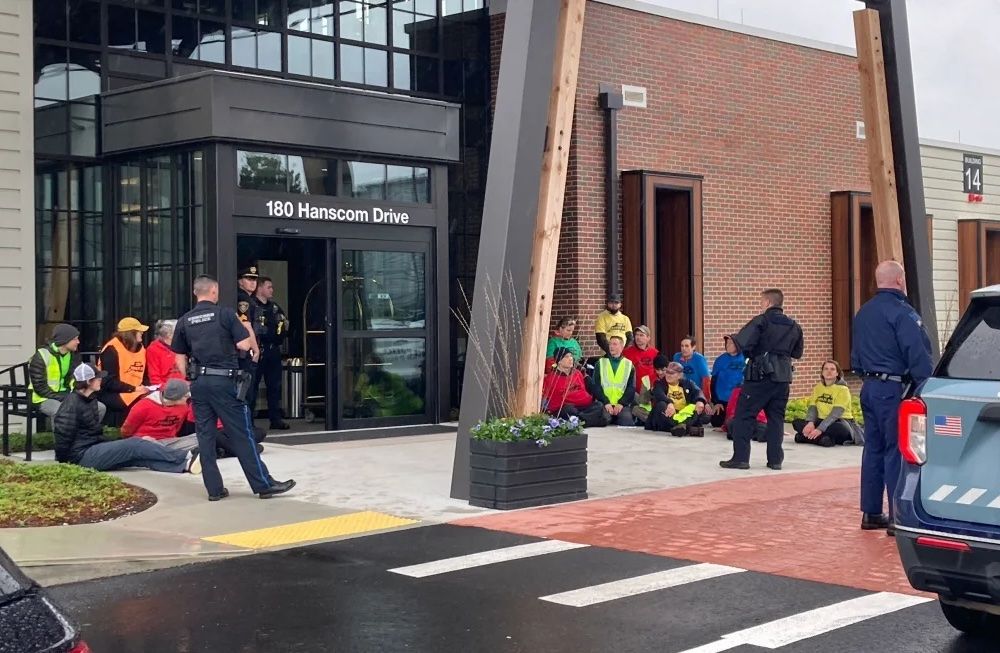 20 Extinction Rebellion Protesters Arrested At Lawrence G. Hanscom Field In Massachusets