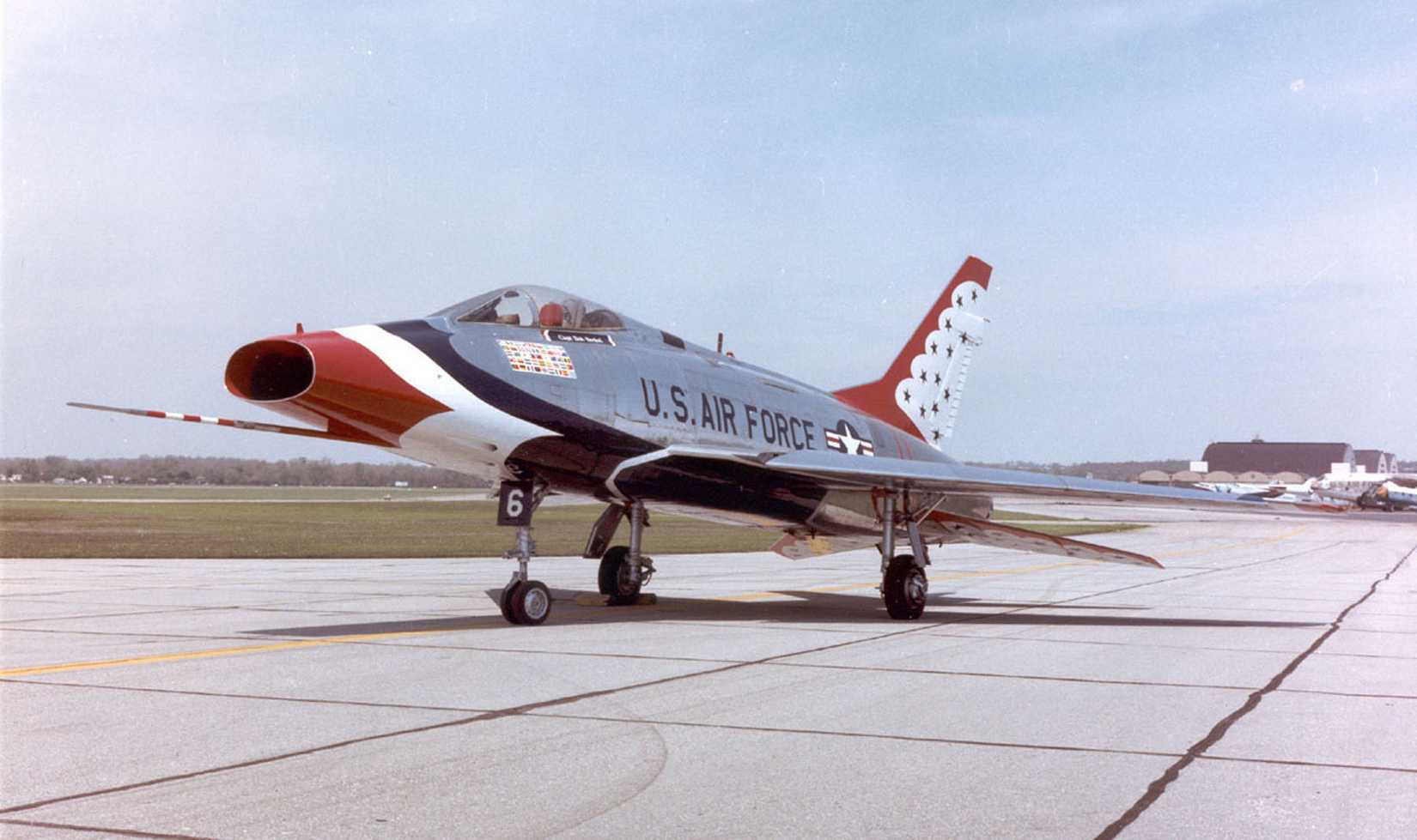 An F-100 Super Sabre on an airport apron.