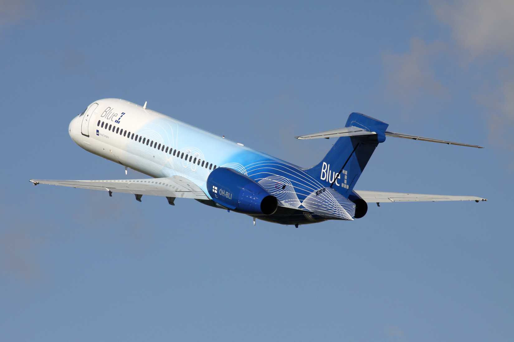 Finnish Blue1 Boeing 717-200 with registration OH-BLI just airborne at Amsterdam Airport Schiphol.