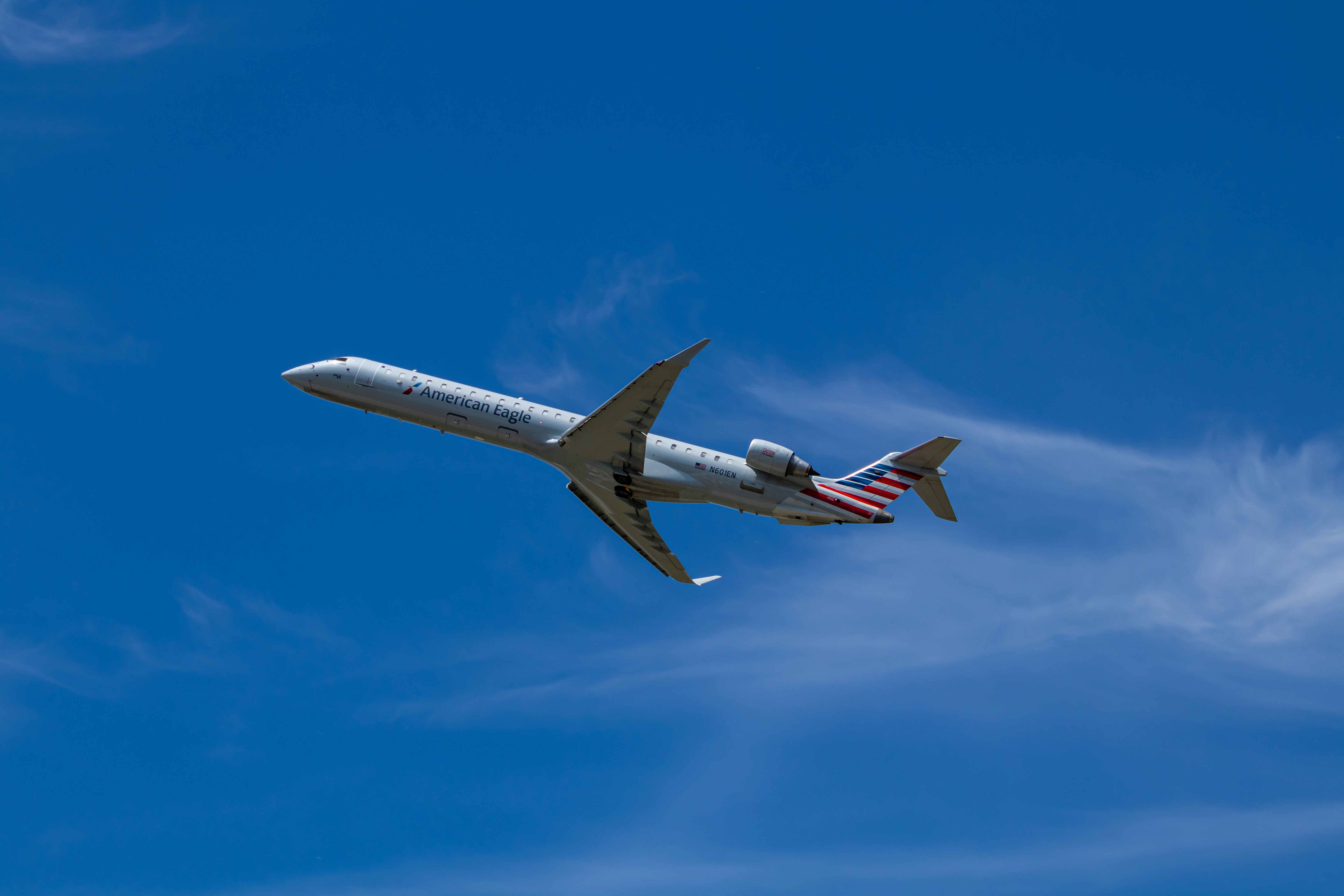 Wild Winds: American Eagle Bombardier CRJ900 Damaged After Being Struck By Baggage Cart