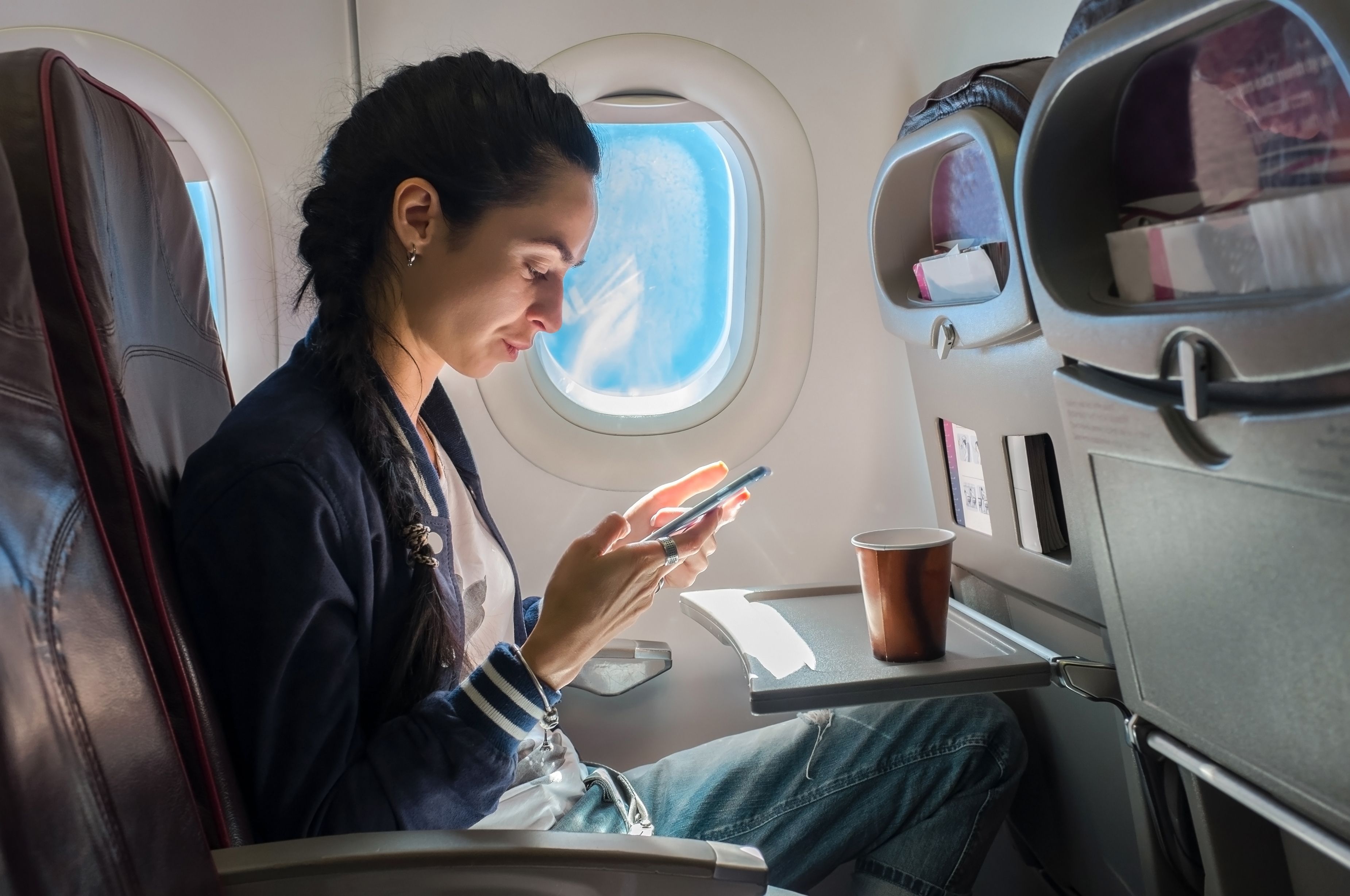 Here's Why You Can't Retrieve Your Phone If It Falls Between Airplane Seats