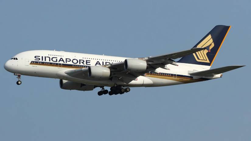 A Singapore Airlines Airbus A380 flying in the sky. (1)