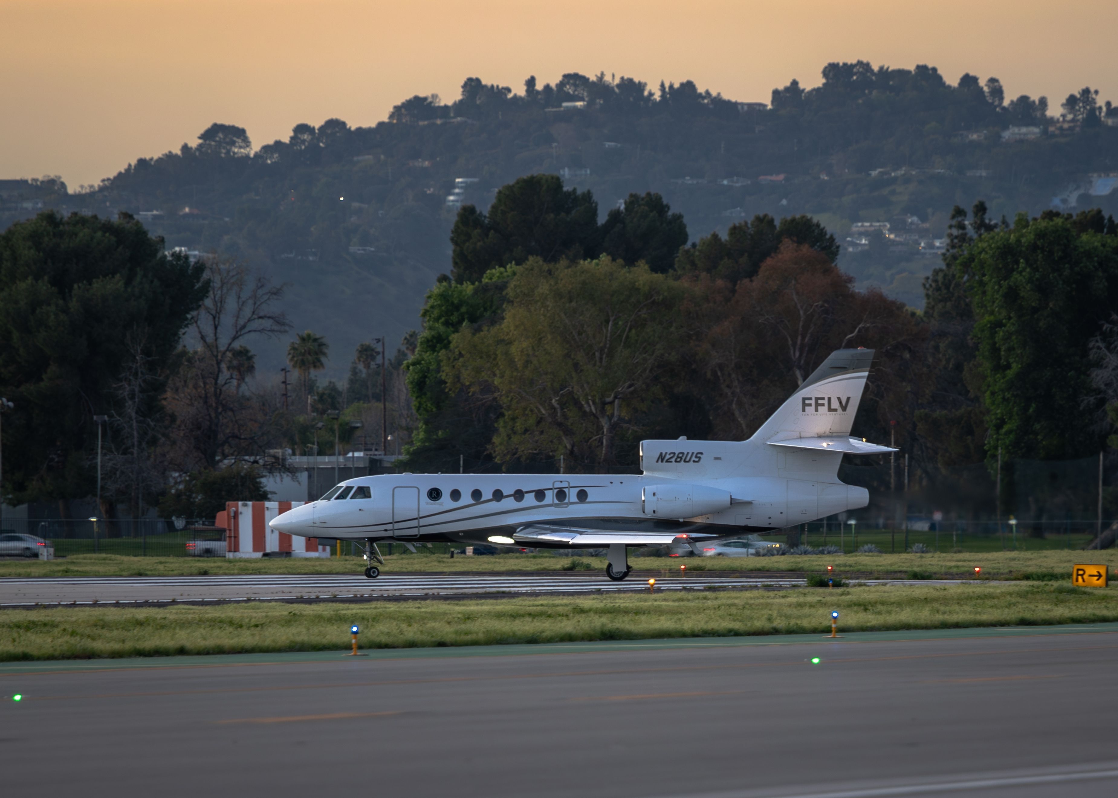Van Nuys, CA - March 13, 2024 - Dassault Falcon 50 taxing onto the runway for departure.