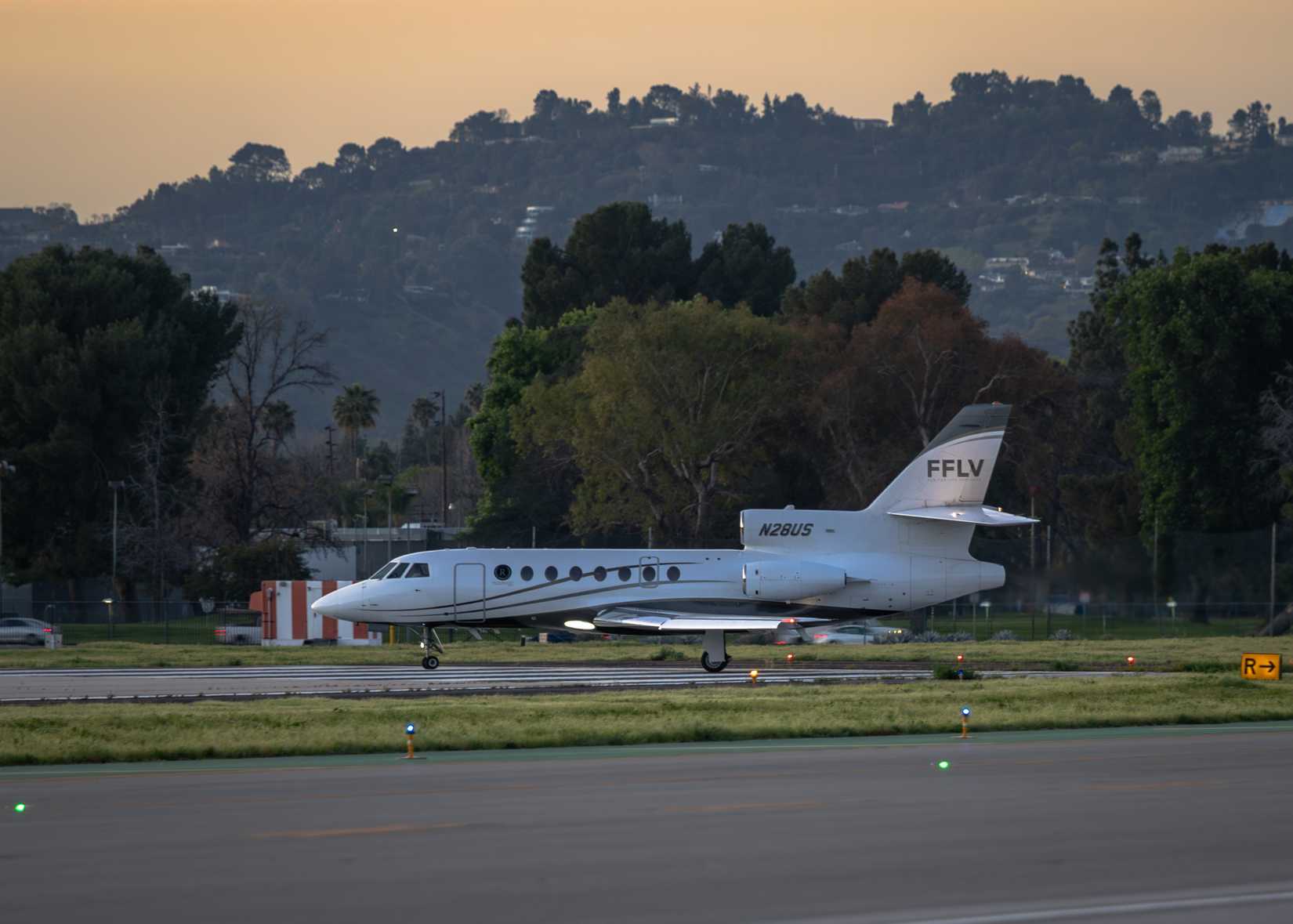 Van Nuys, CA - March 13, 2024 - Dassault Falcon 50 taxing onto the runway for departure.