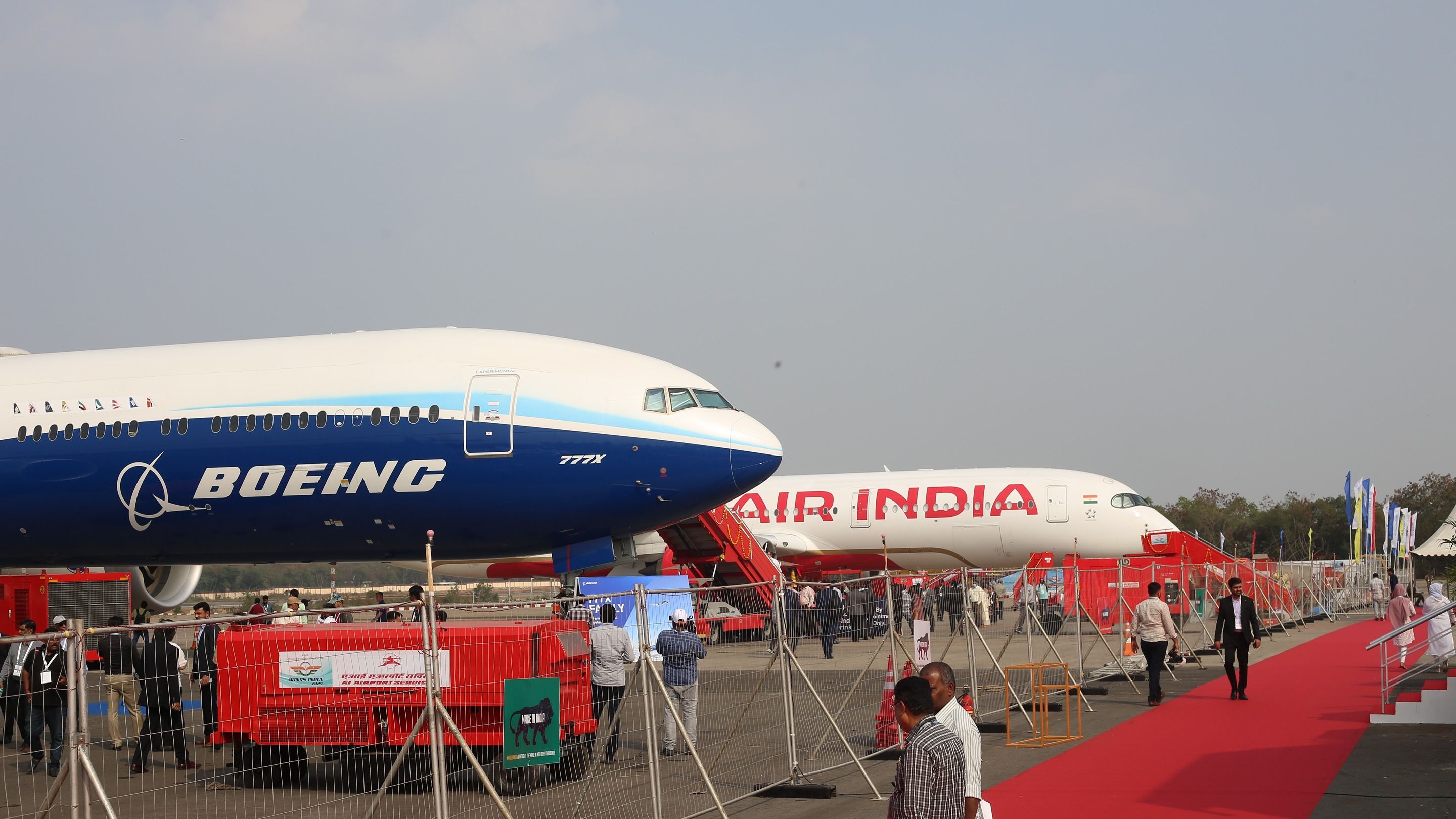 Boeing 777X with an Air India Airbus A350-900 in the background at Wings India 2024 shutterstock_2416278881