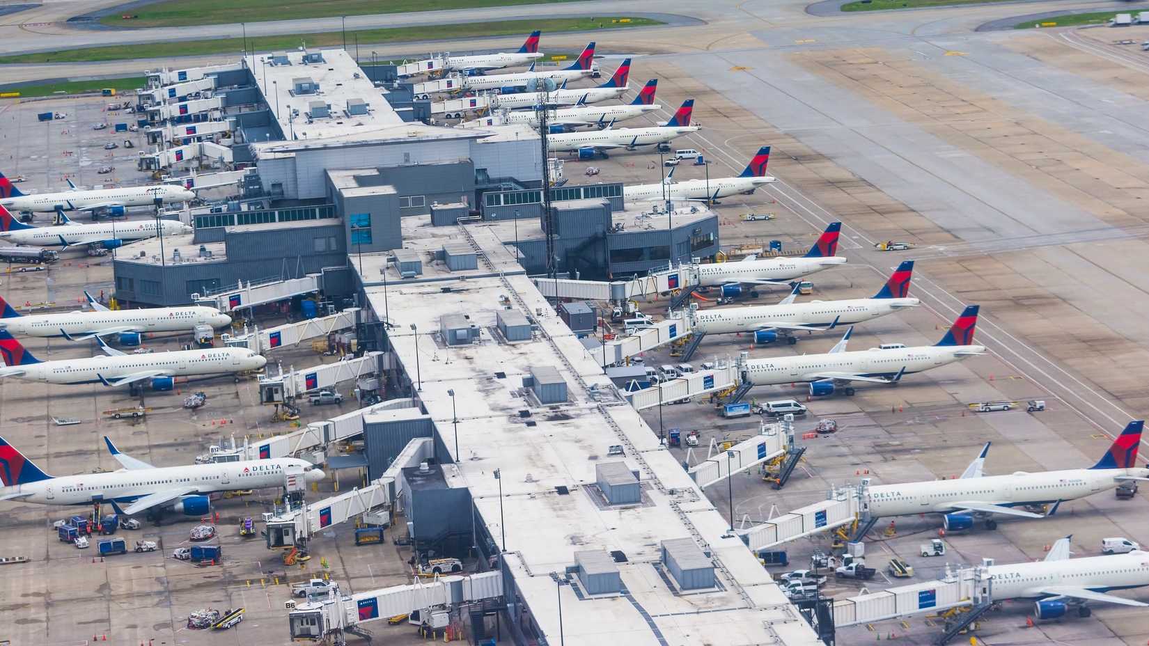 Dozens of Delta Air Lines aircraft parked at Hartsfield-Jackson Atlanta International Airport.