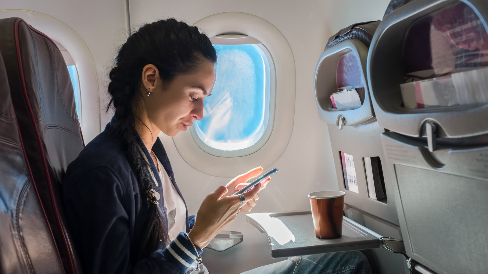 Here's Why You Can't Retrieve Your Phone If It Falls Between Airplane Seats