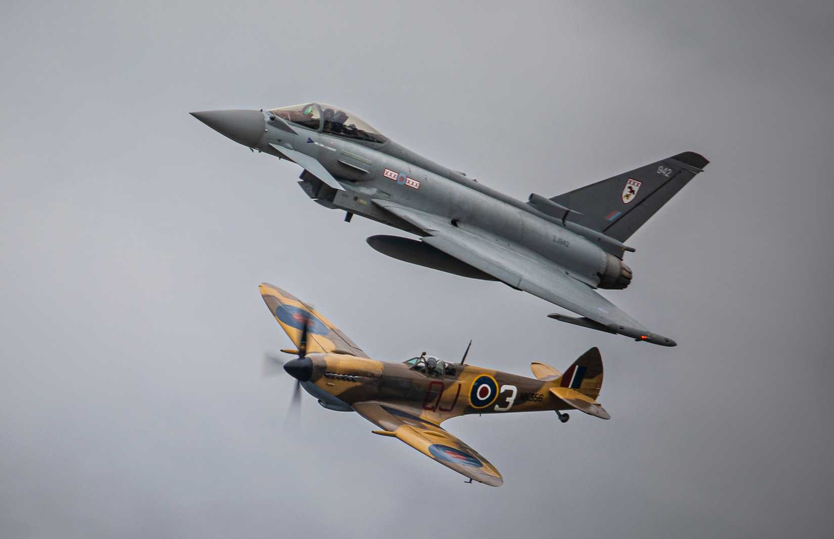 CON-20220520-0443-Typhoon Spitfire Syncro  (2) (2) - A 29 Sqn Typhoon FGR4 flown by the RAF Typhoon Display Team pilot Flight Leiutenant (Paddy) O’Hare and the Battle of Britain Memorial Flight Spitfire perform in a unique syncro pair formation. The Typhoon Display and the Spitfire are vastly different in power but manage to stay together in this truly iconic image.Images, SGT Paul Oldfield, 20th May 2022