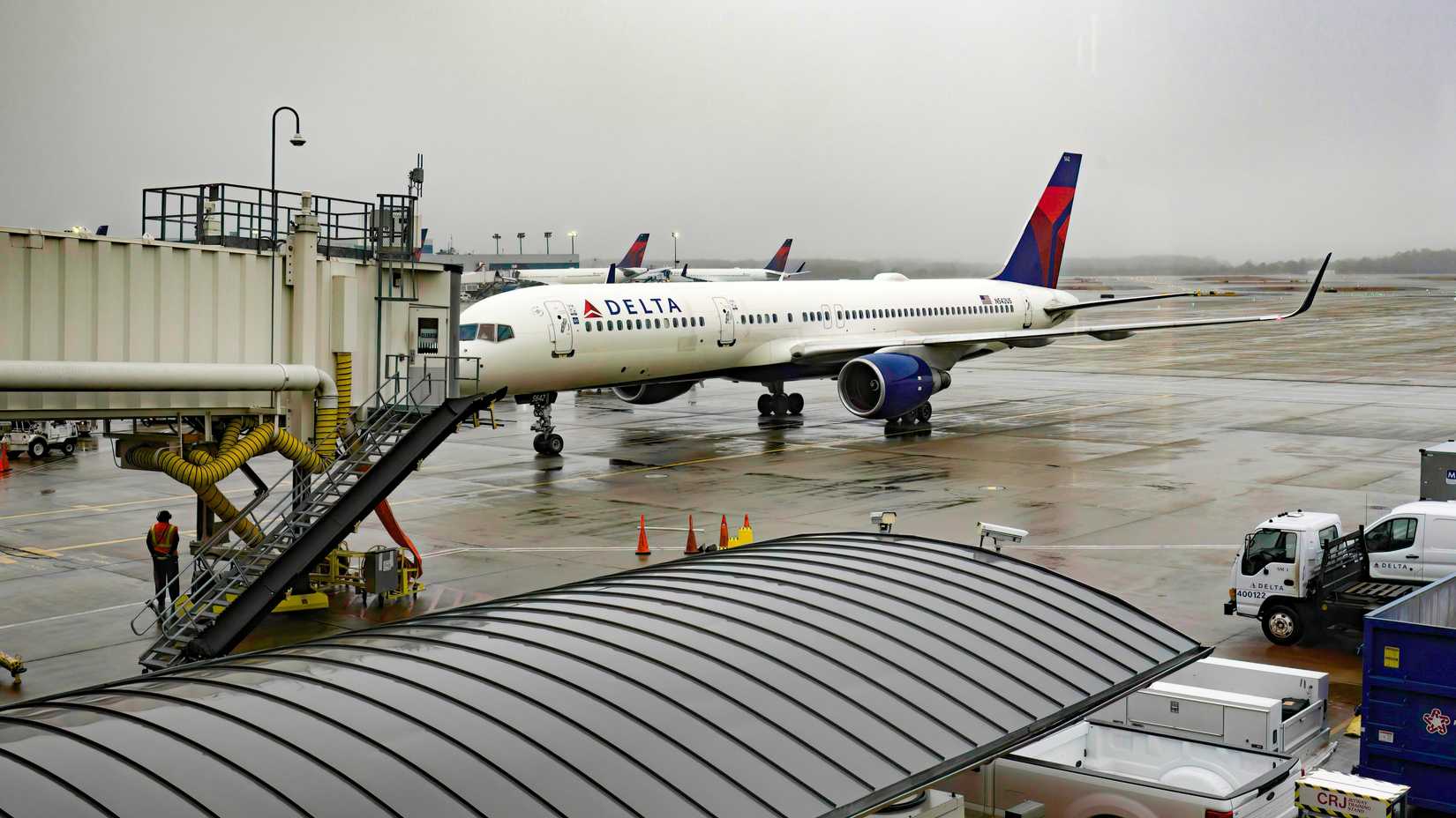 Delta Air Lines Boeing 757 at the gate at Hartsfield-Jackson Atlanta International Airport ATL shutterstock_2421356081