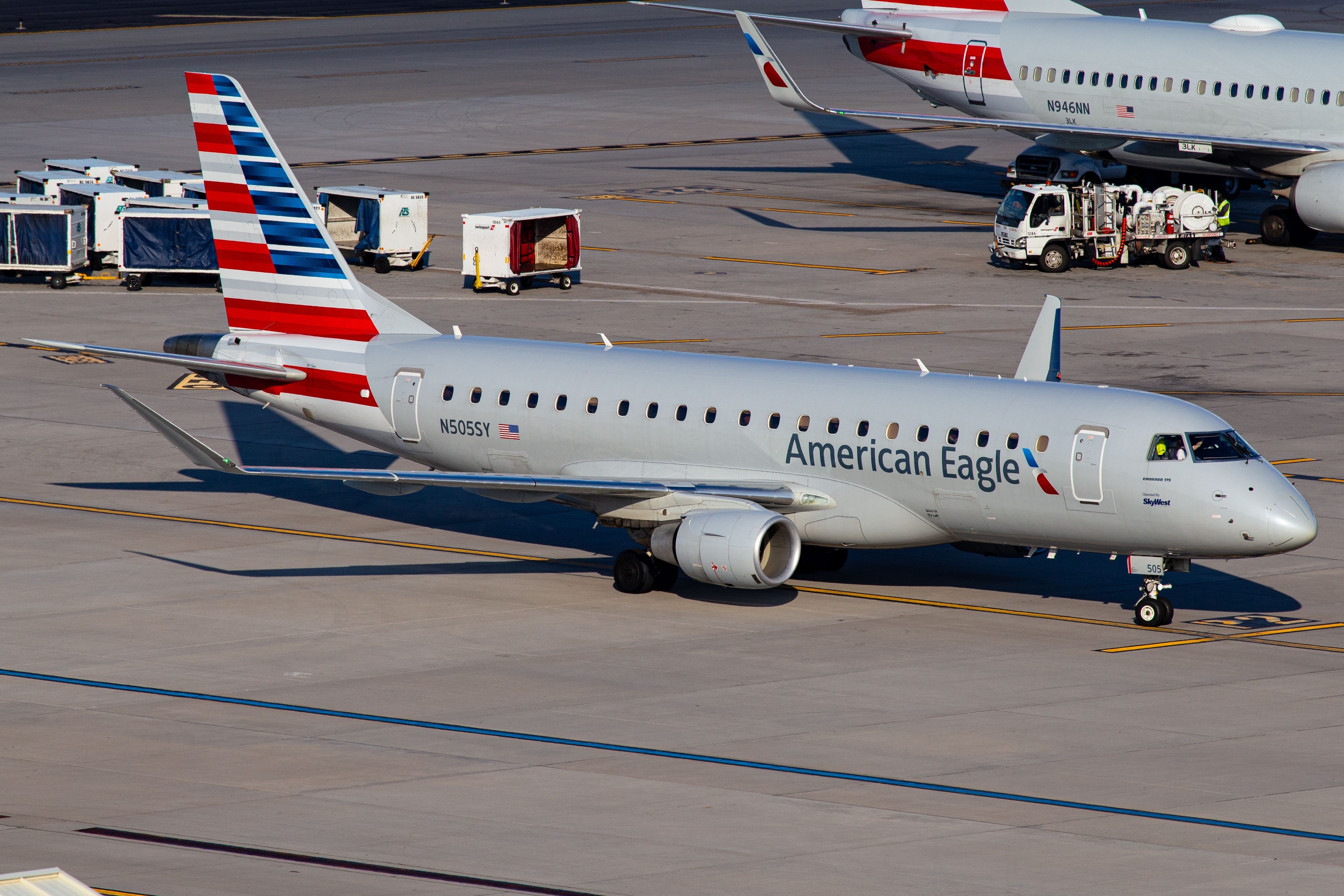 American Eagle Embraer E175 at Pheonix Sky Harbor International Airport PHX shutterstock_2495749479