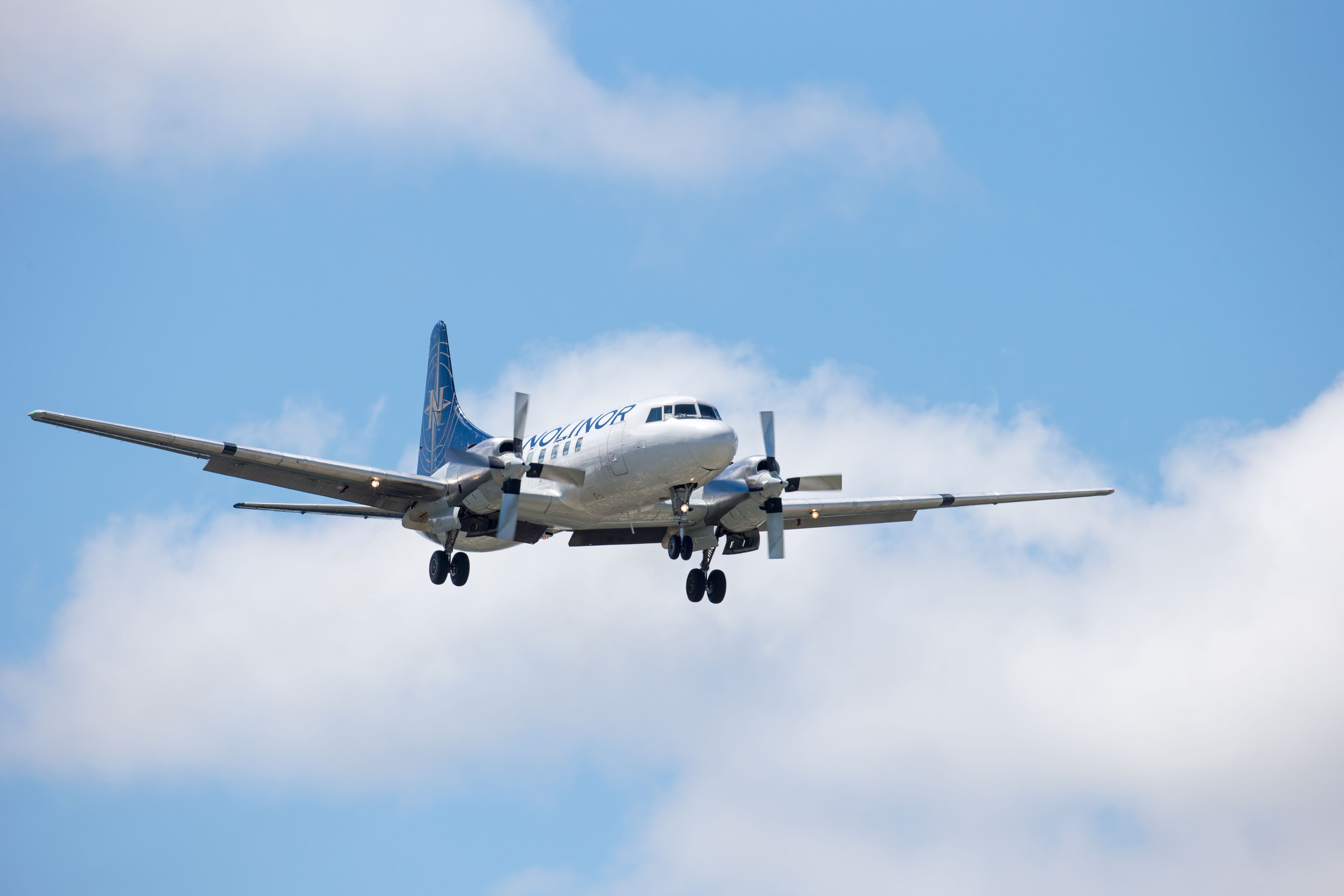 A Nolinor Aviation Convair 440 Metropolitan, with identification C-GQHB, landing at Winnipeg International Airport