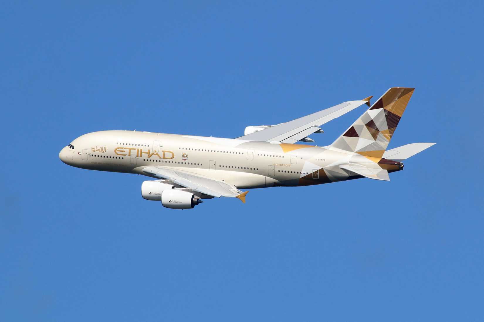 Etihad Airways Airbus A380 departing London Heathrow Airport LHR