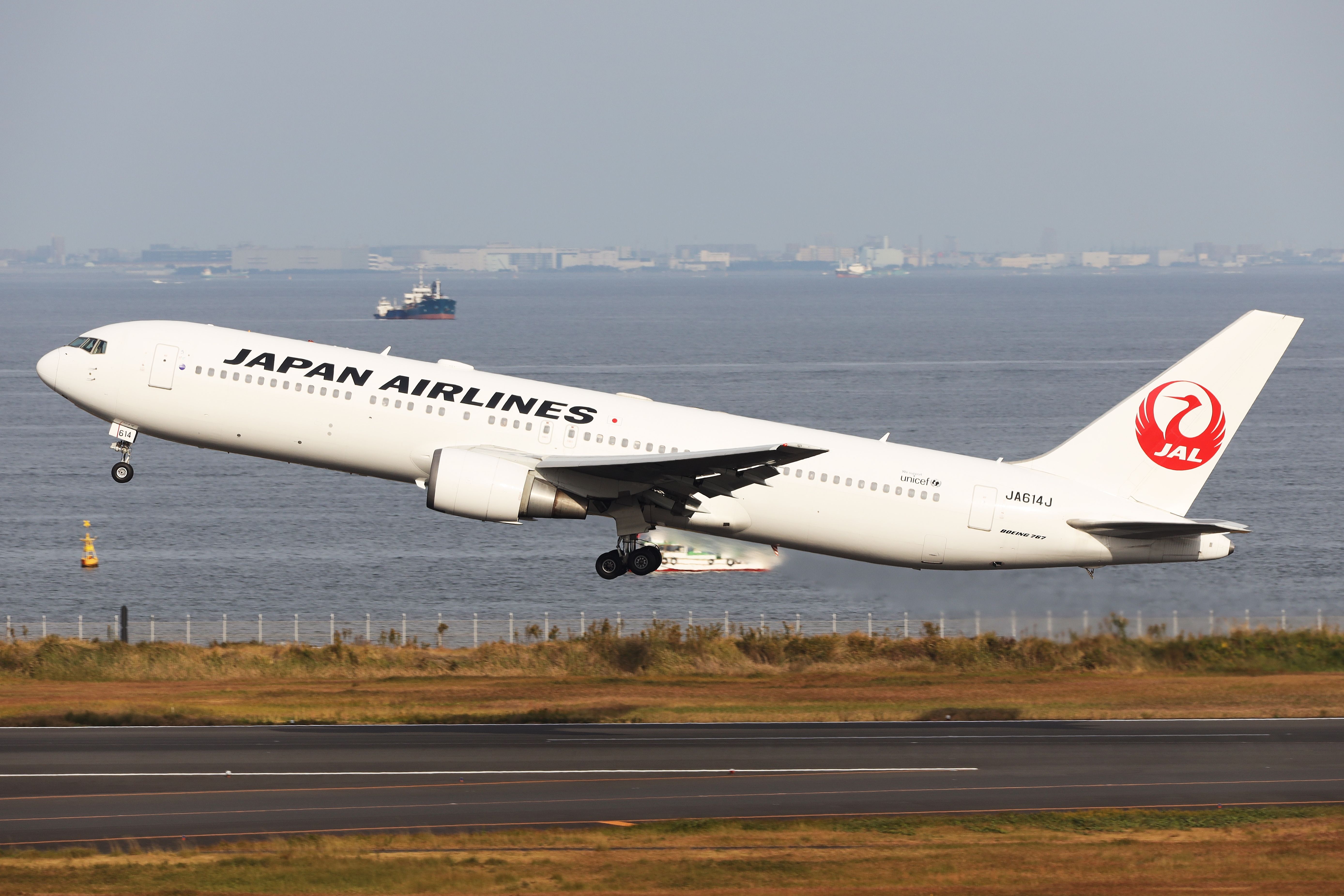 Japan Airlines Boeing 767-300 take off from Tokyo Haneda International Airport.