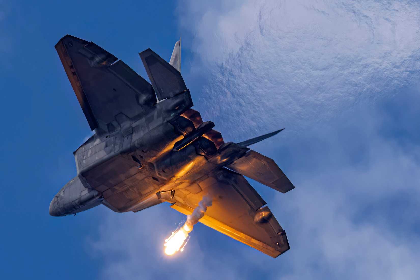 F-22 raptor in the air shortly after takeoff