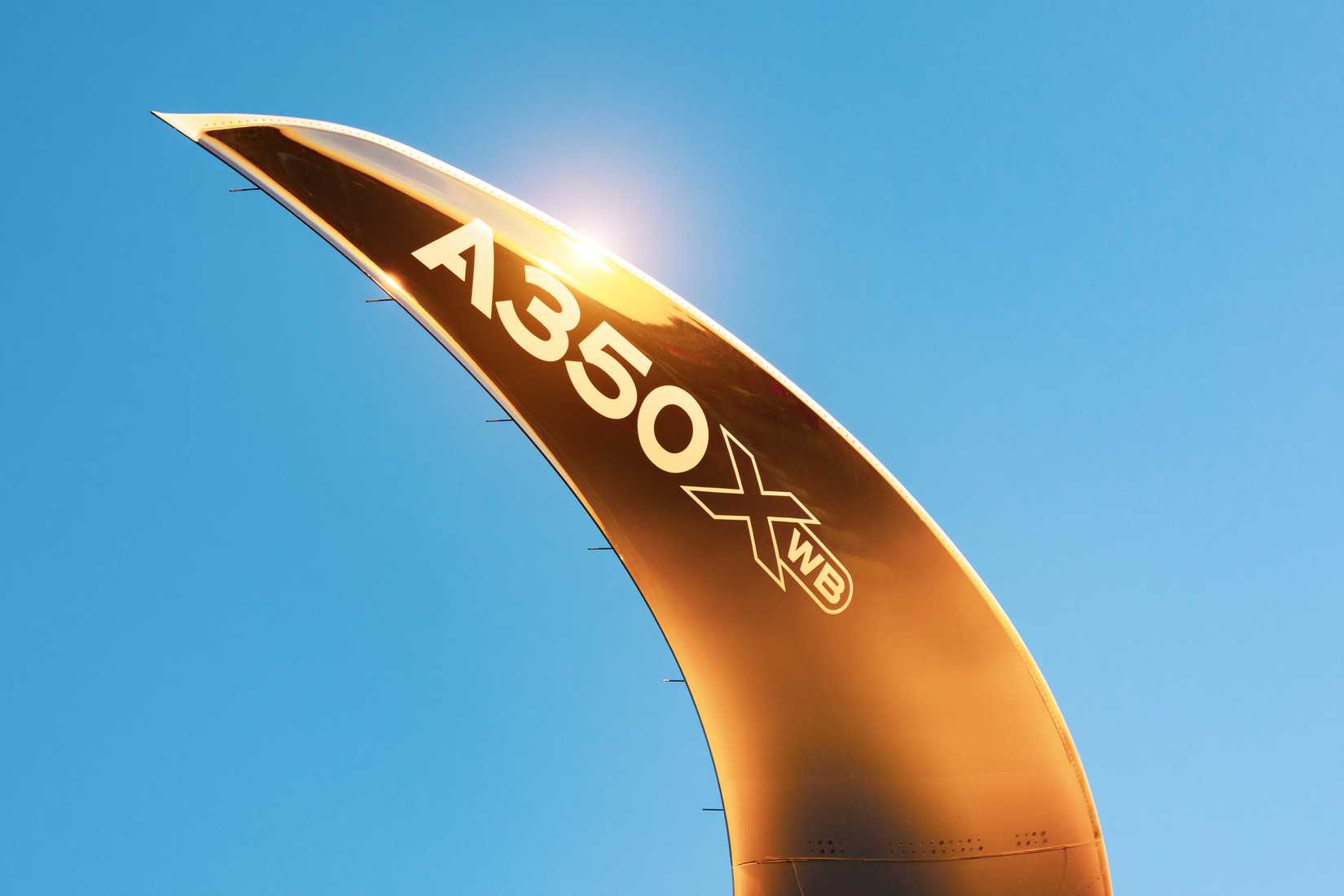 Airbus A350-900 winglet during golden hour conditions shutterstock_1494855611