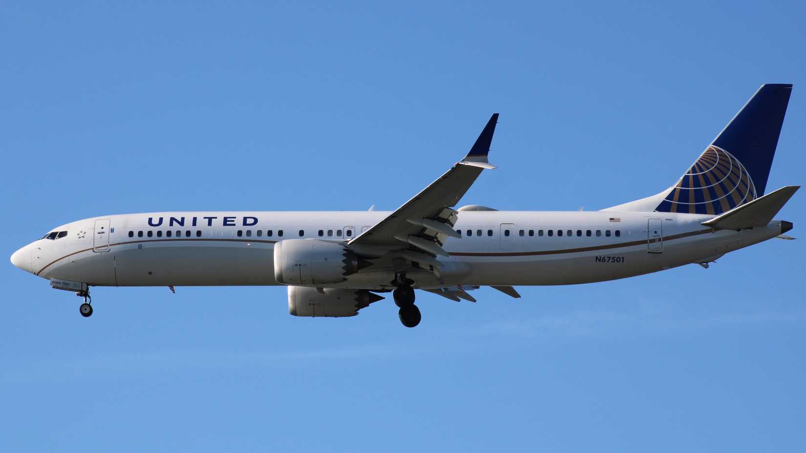 United Airlines Boeing 737 MAX 9 landing at Boston Logan International Airport BOS shutterstock_2142624865