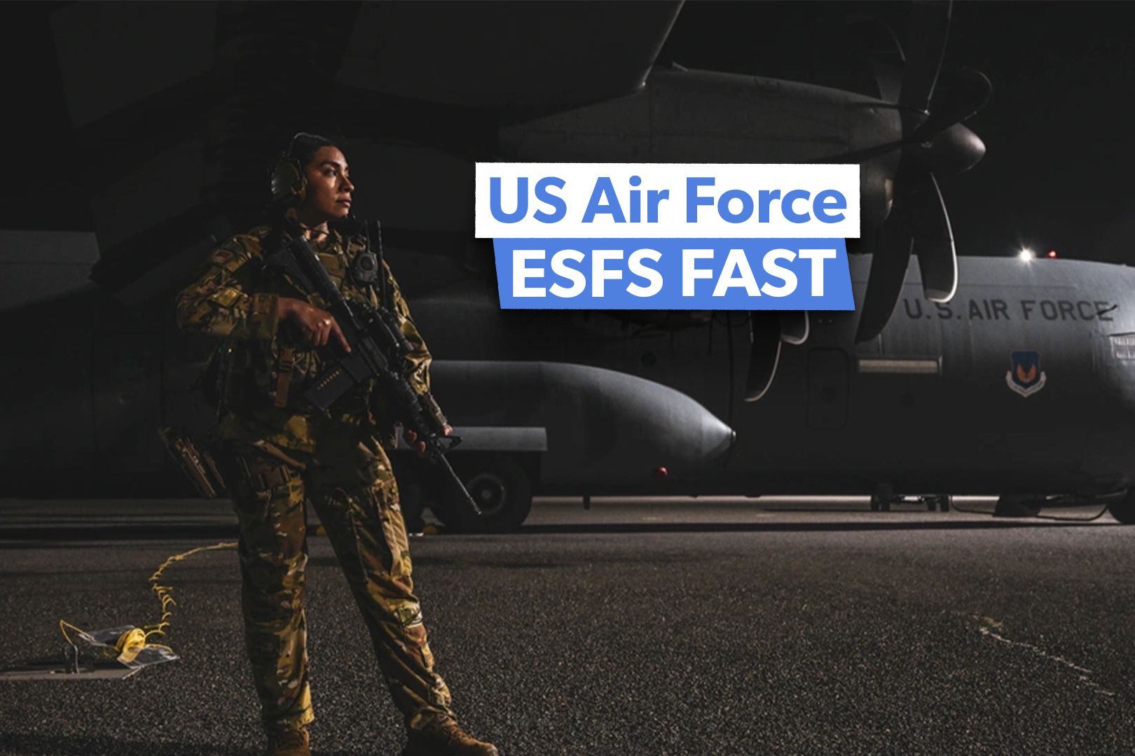3_2 Airman assigned to the 386th Expeditionary Security Forces Squadron Fly Away Security Team stands watch next to a C-130J Super Hercules