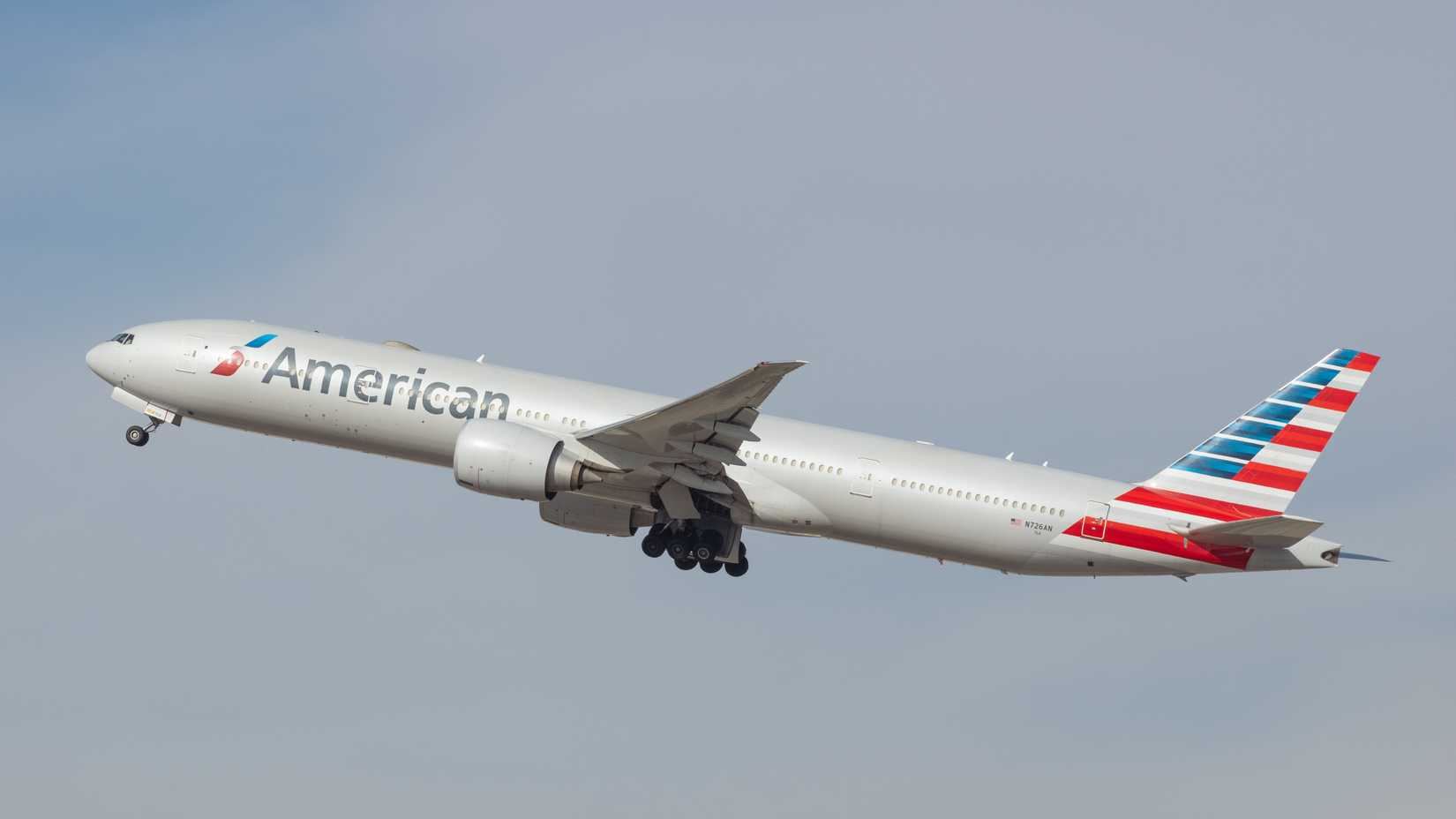 American Airlines Boeing 777-300ER departing LAX shutterstock_1886783047