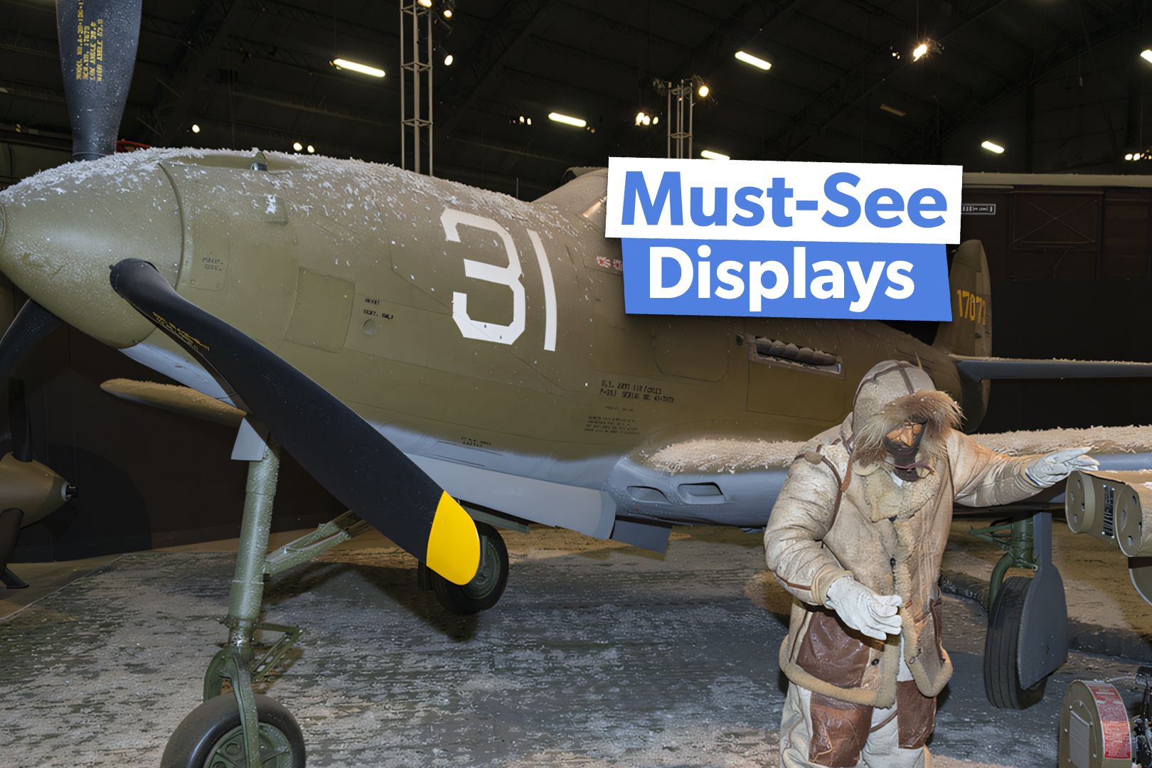 ground crew with a Type F-1A Utility Heater in front of an Airacobra flown by Lt. L. Spoonts of the 57th FS based on Adak Island