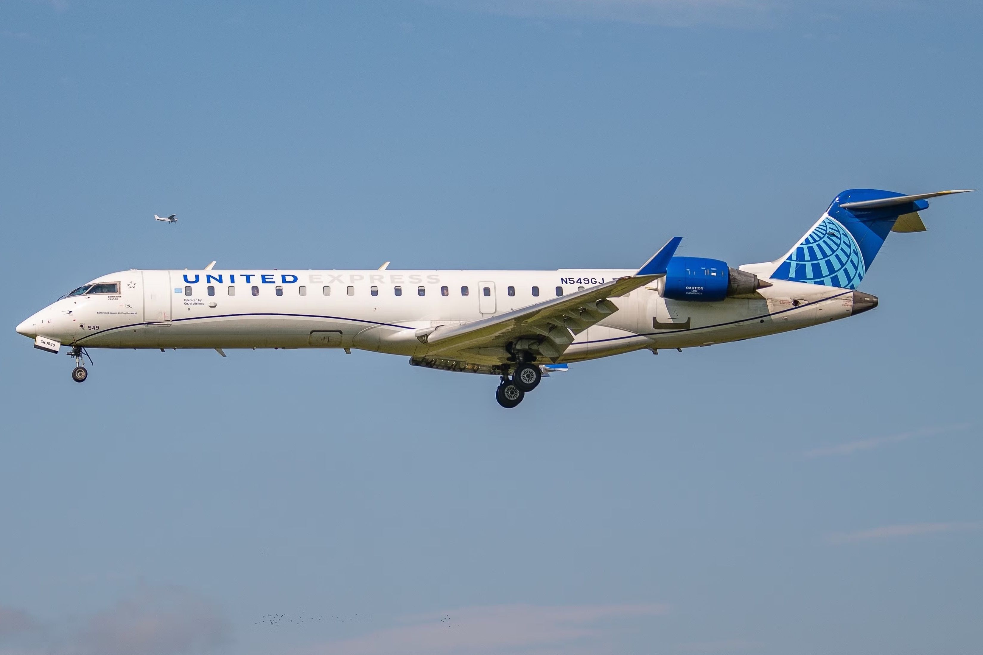 United Express CRJ550 Skids Off Taxiway In St. Louis