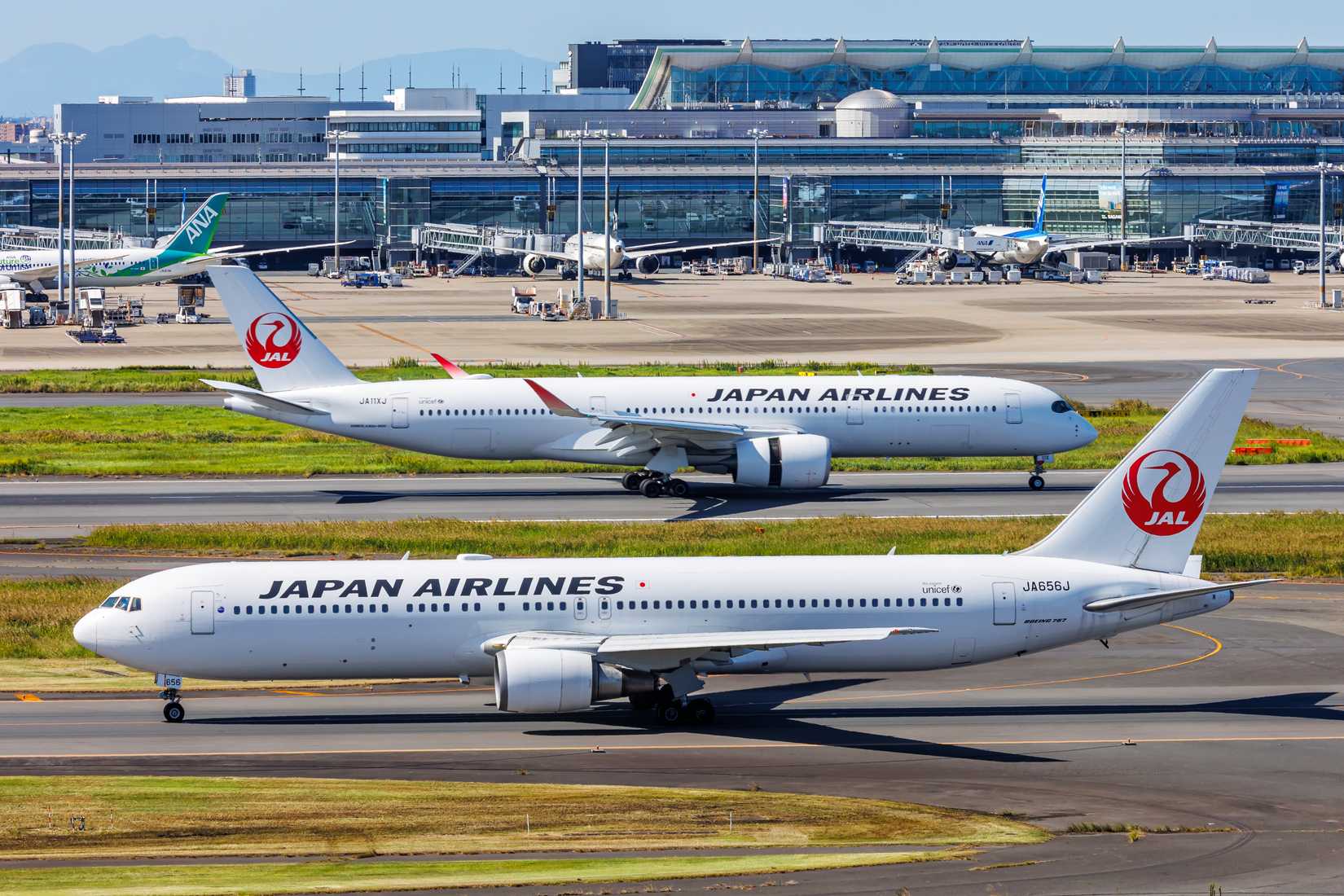 Japan Airlines Airbus and Boeing aircraft at Tokyo Haneda Airport HND