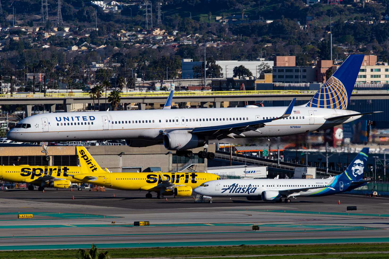 Alaska Airlines, Spirit Airlines, and United Airlines aircraft at LAX 