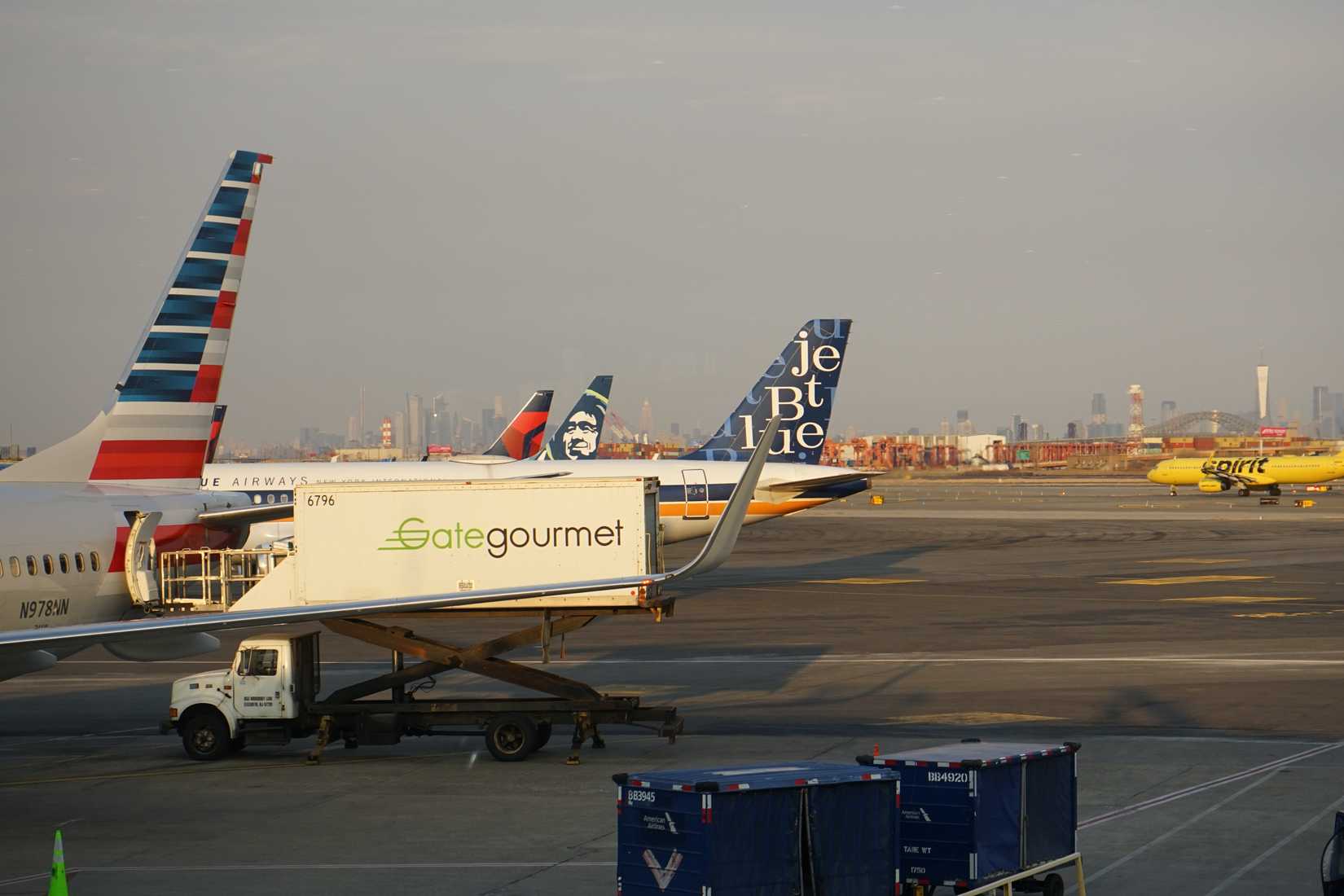 American Airlines, Alaska Airlines, Delta Air Lines, JetBlue, and Spirit Airlines aircraft at EWR shutterstock_2205345125