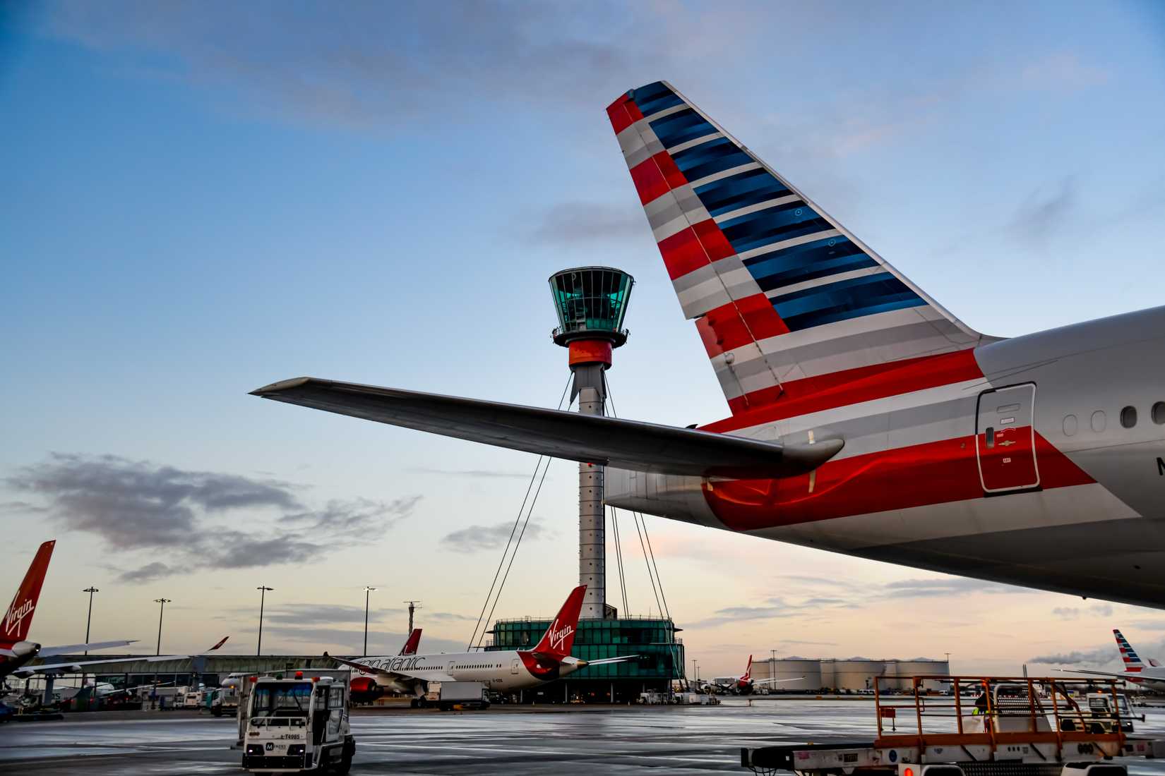 American Airlines and Virgin Atlantic aircraft at London Heathrow Airport LHR shutterstock_1597290313