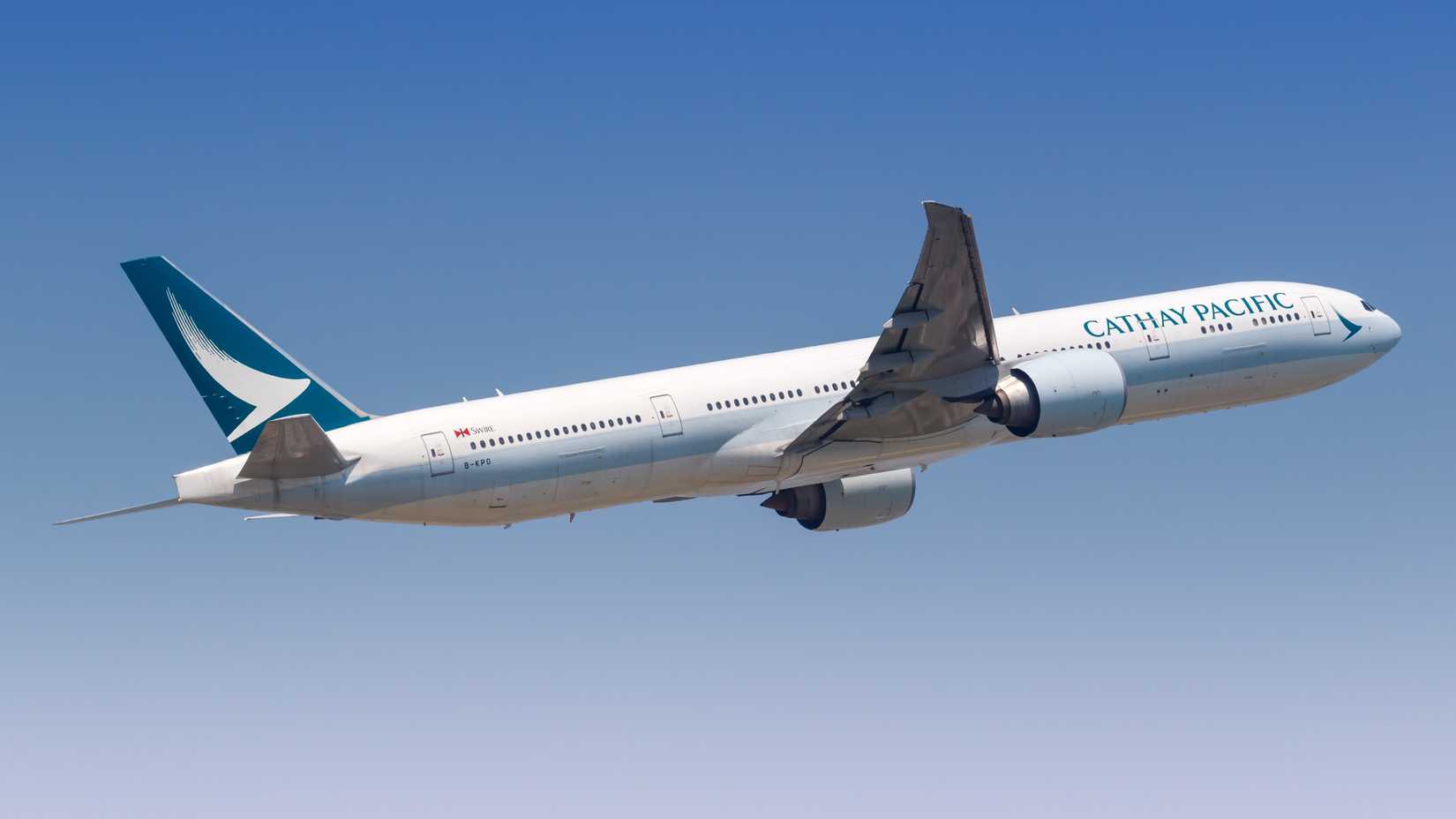 Cathay Pacific Boeing 777-300ER departing HKG shutterstock_1539390197