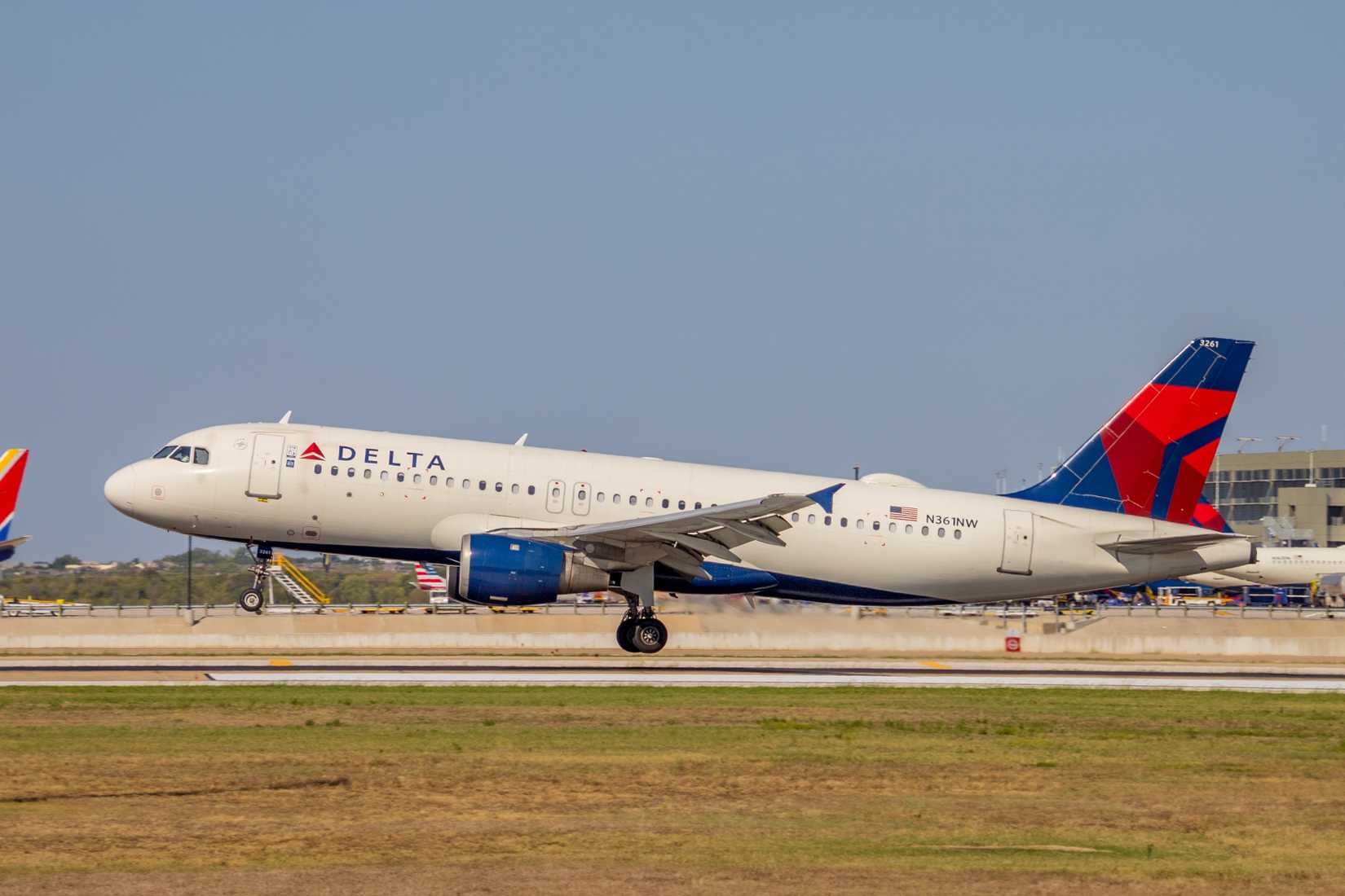 Delta Air Lines Airbus A320 departing AUS shutterstock_2375423587