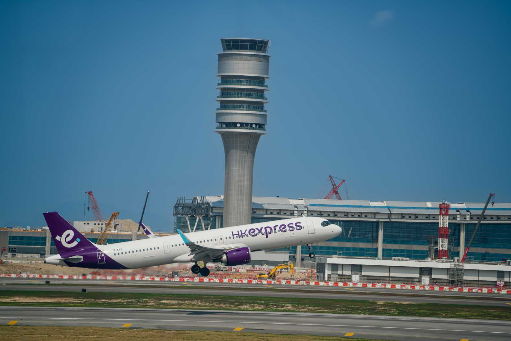 HK Express Airbus A320neo departing Hong Kong International Airport HKG shutterstock_2593366147
