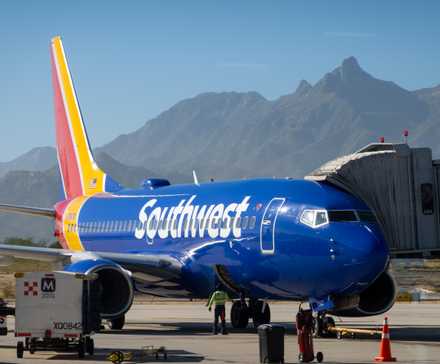 Southwest Airlines Boeing 737 parked at the gate in Cabo, Mexico shutterstock_2549166423