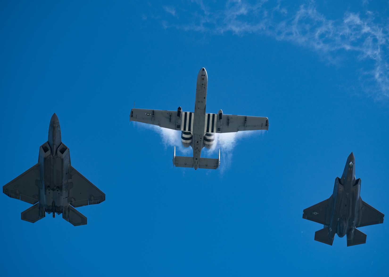 Air Force Maj. Cody ShIV Wilton, A-10 Demonstration Team pilot,flies as part of a heritage flight formation