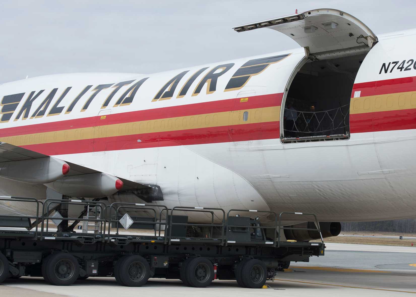 Airmen from the 436th Aerial Port Squadron load cargo onto a Kalitta Air Boeing 747 March 24, 2017, at Dover Air Force Base, Del.
