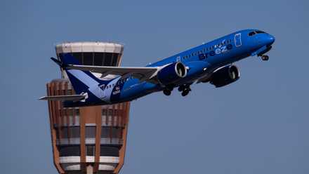 Breeze Airways Airbus A220-300 departing Phoenix Sky Harbor International Airport PHX shutterstock_2375023163