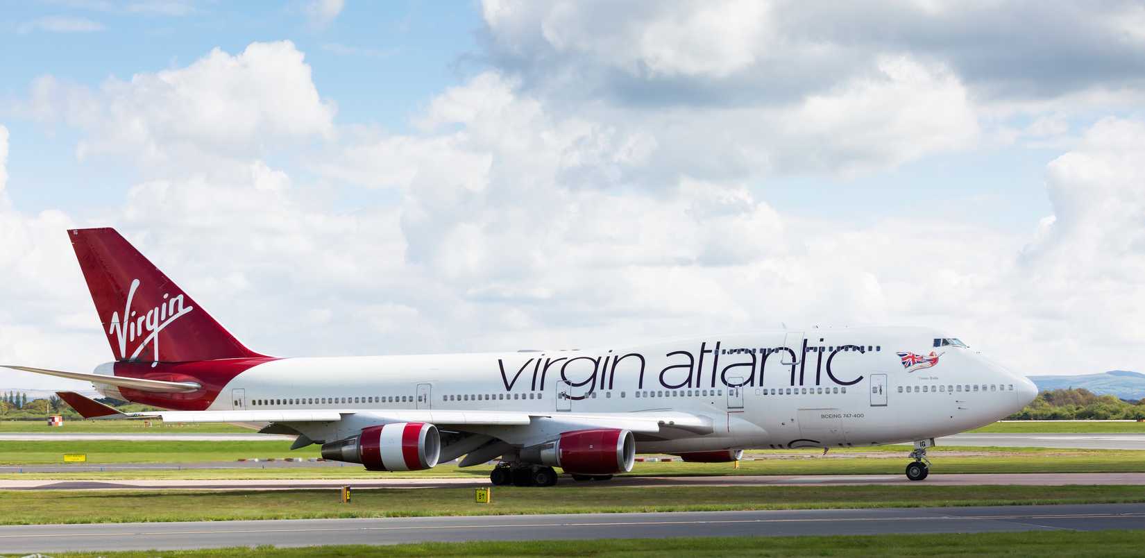 Virgin Atlantic boeing 747-400 preparing to take off at Manchester Airport, UK