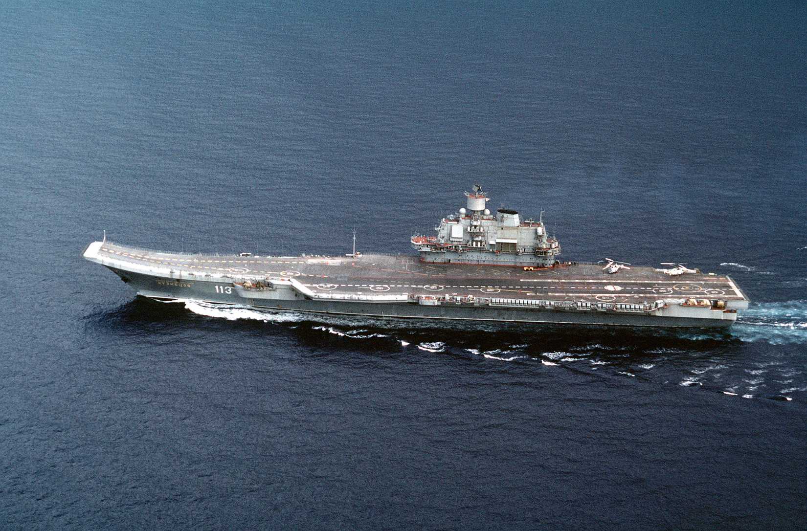 A port beam view of the Soviet aircraft carrier FLEET ADMIRAL of the SOVIET UNION KUZNETSOV underway south of Italy, 1991