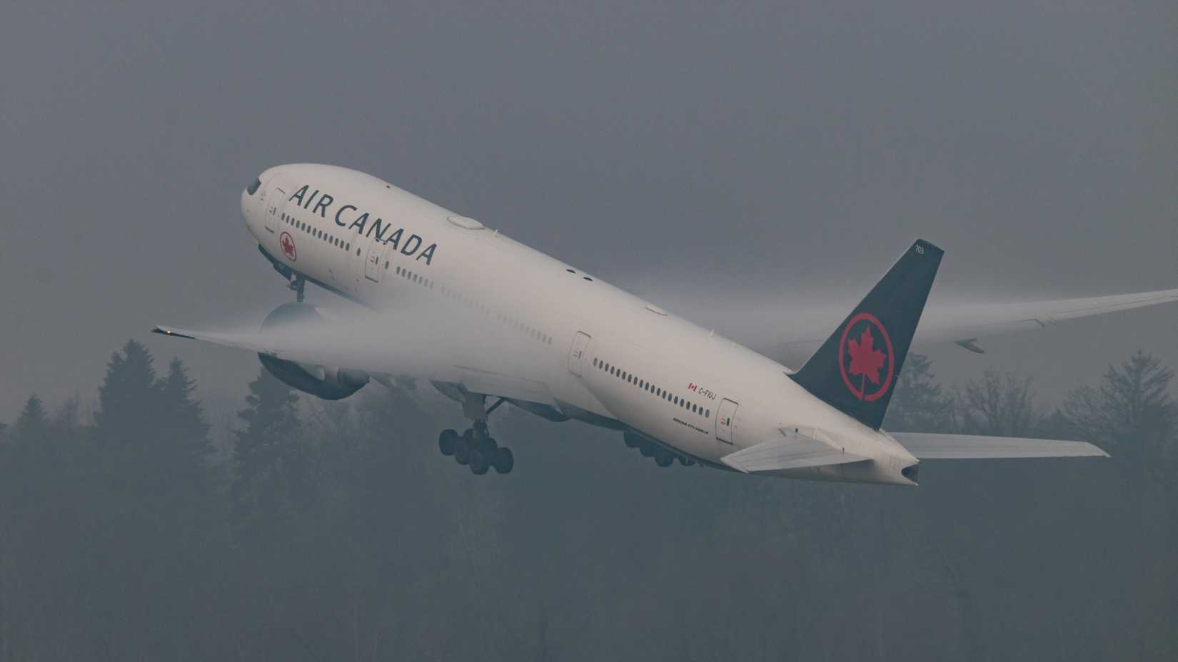 Air Canada Boeing 777-200LR taking off shutterstock_2584830485