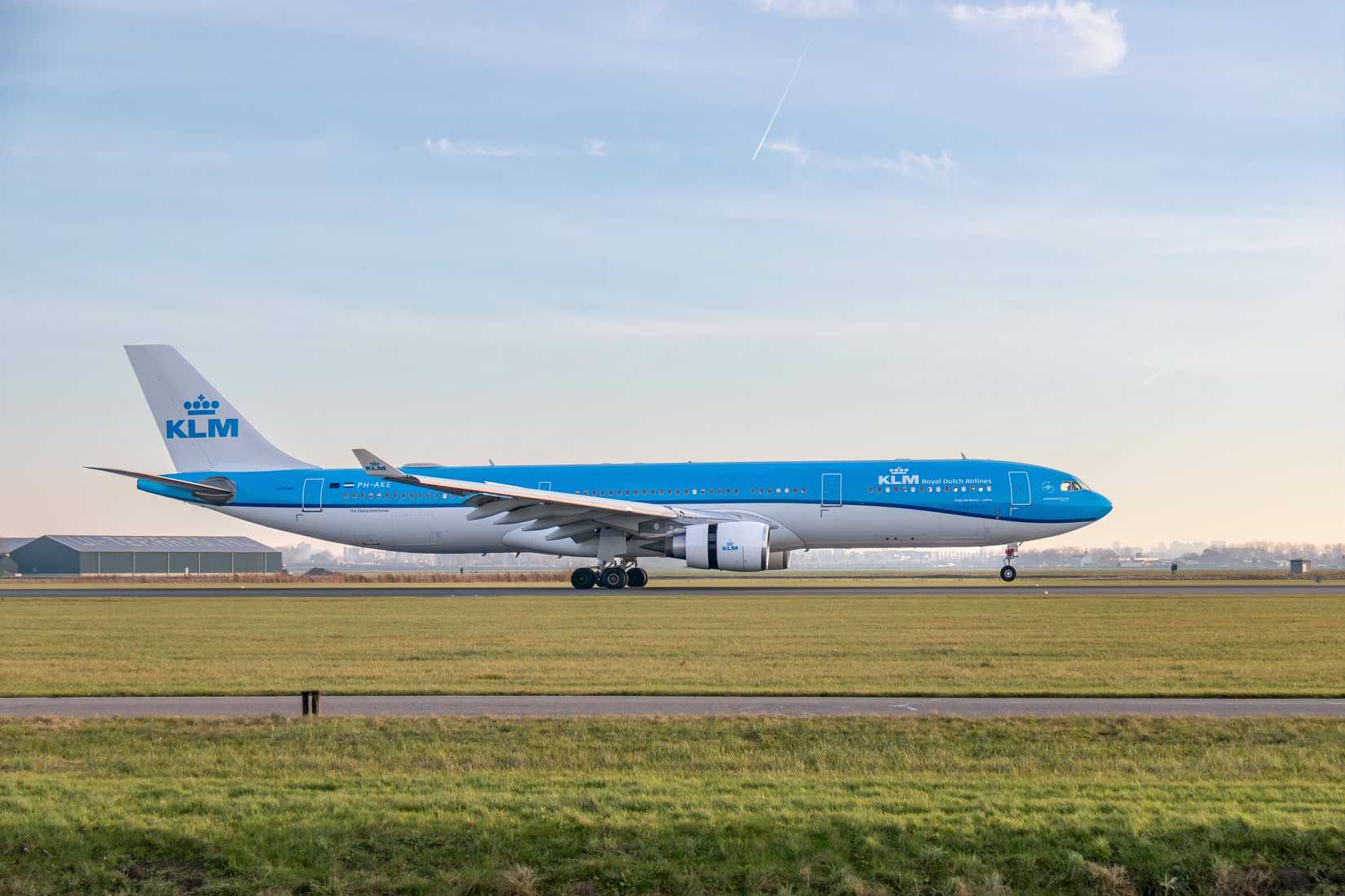 KLM Airbus A330-300 aircraft landing on runway at Schipol