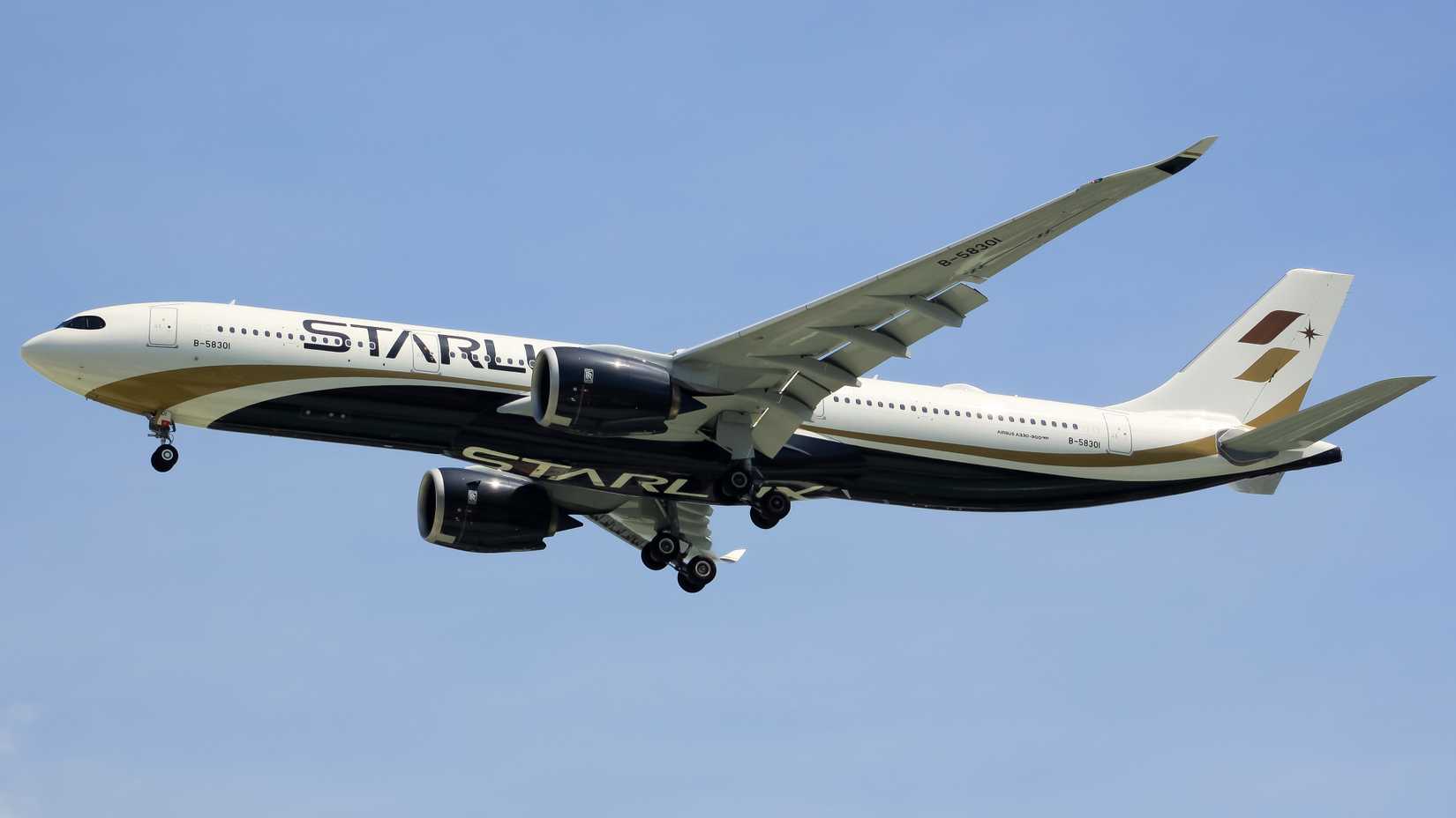 STARLUX Airlines Airbus A330-900 landing at SGN shutterstock_2507083895