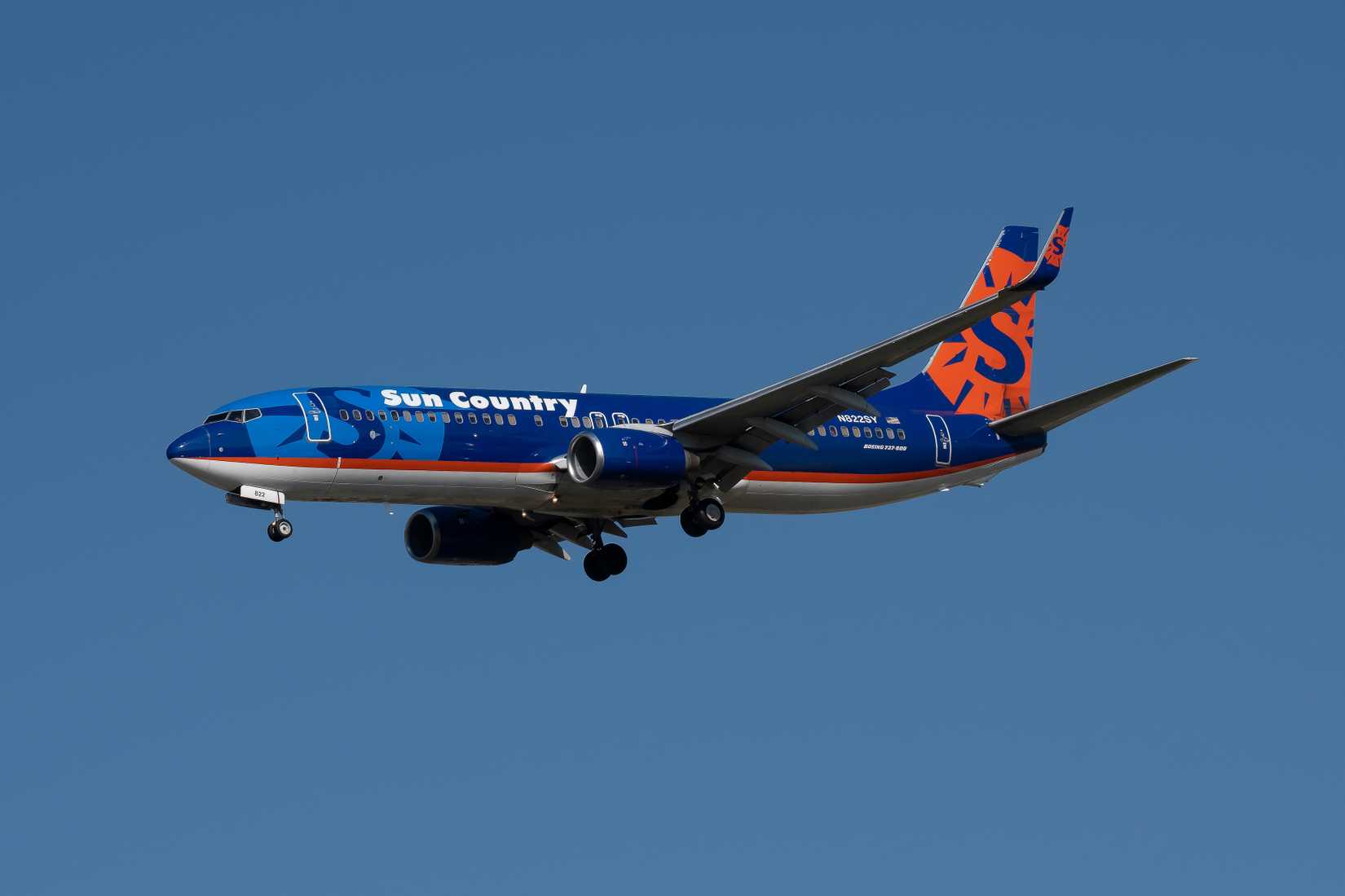 Sun Country Airlines Boeing 737-800 landing at DFW shutterstock_2293741145