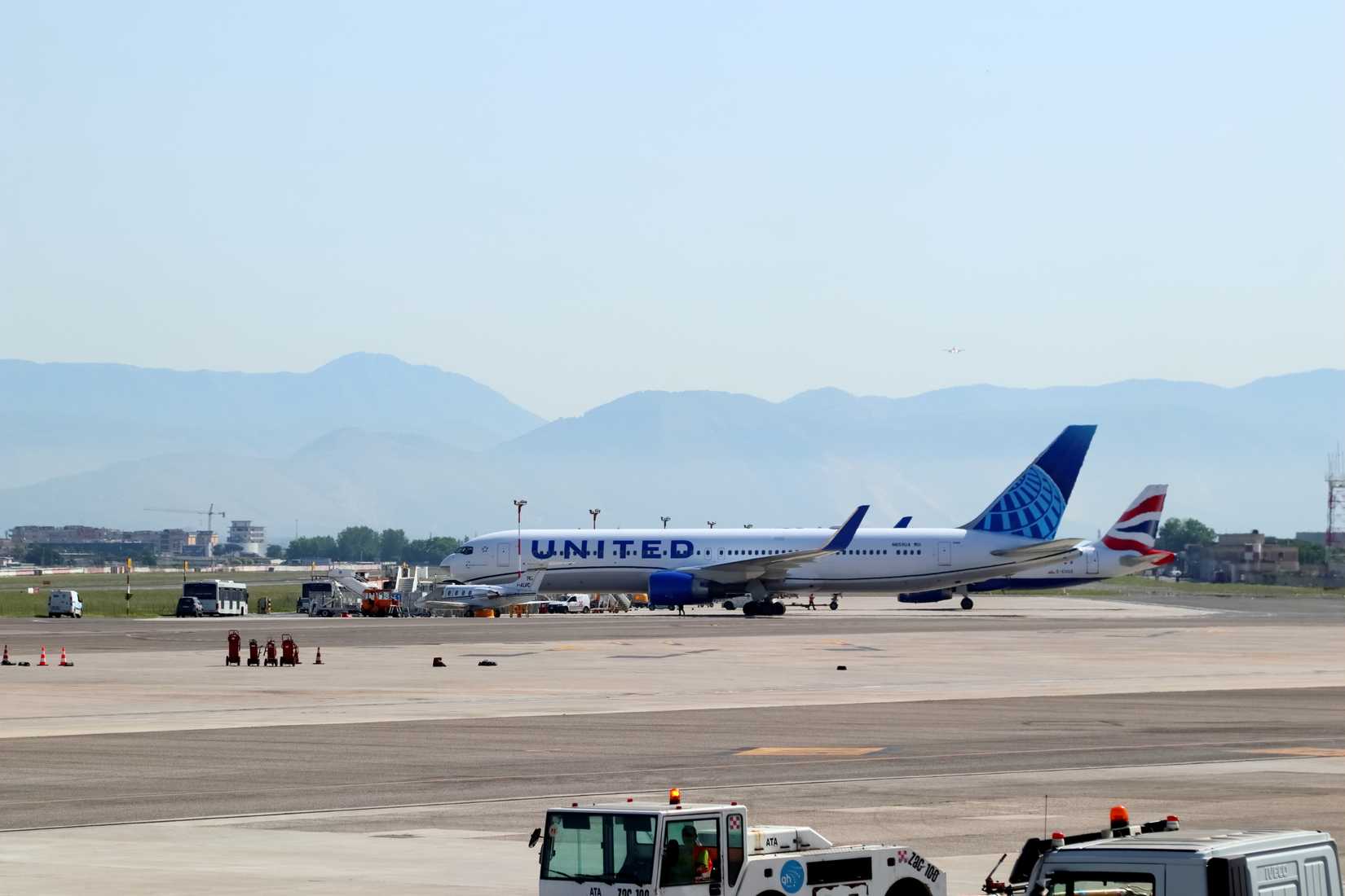 United Airlines Boeing 767 at Naples International Airport NAP shutterstock_2161439945