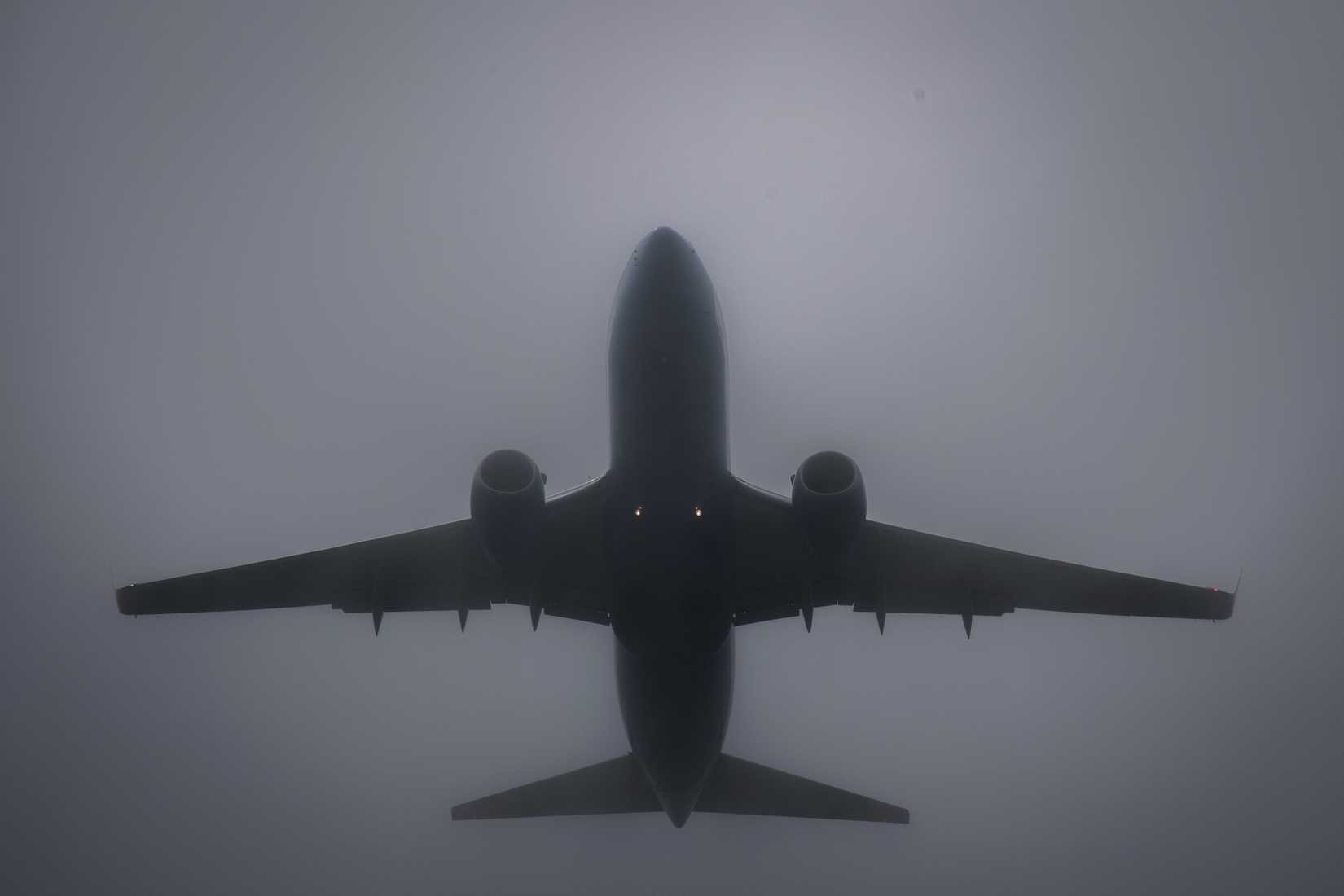A 932nd Airlift Wing C-40C, fights through thick fog as it takes off early morning, Aug. 30, 2018, Scott Air Force Base, Illinois