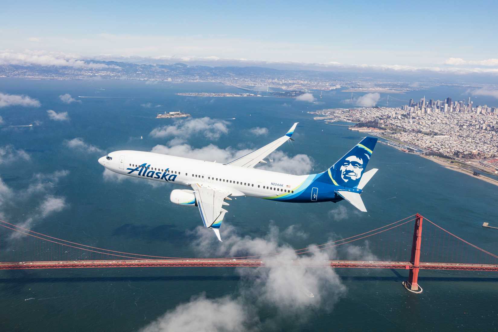 Alaska Airlines 737-900ER over flies San Francisco