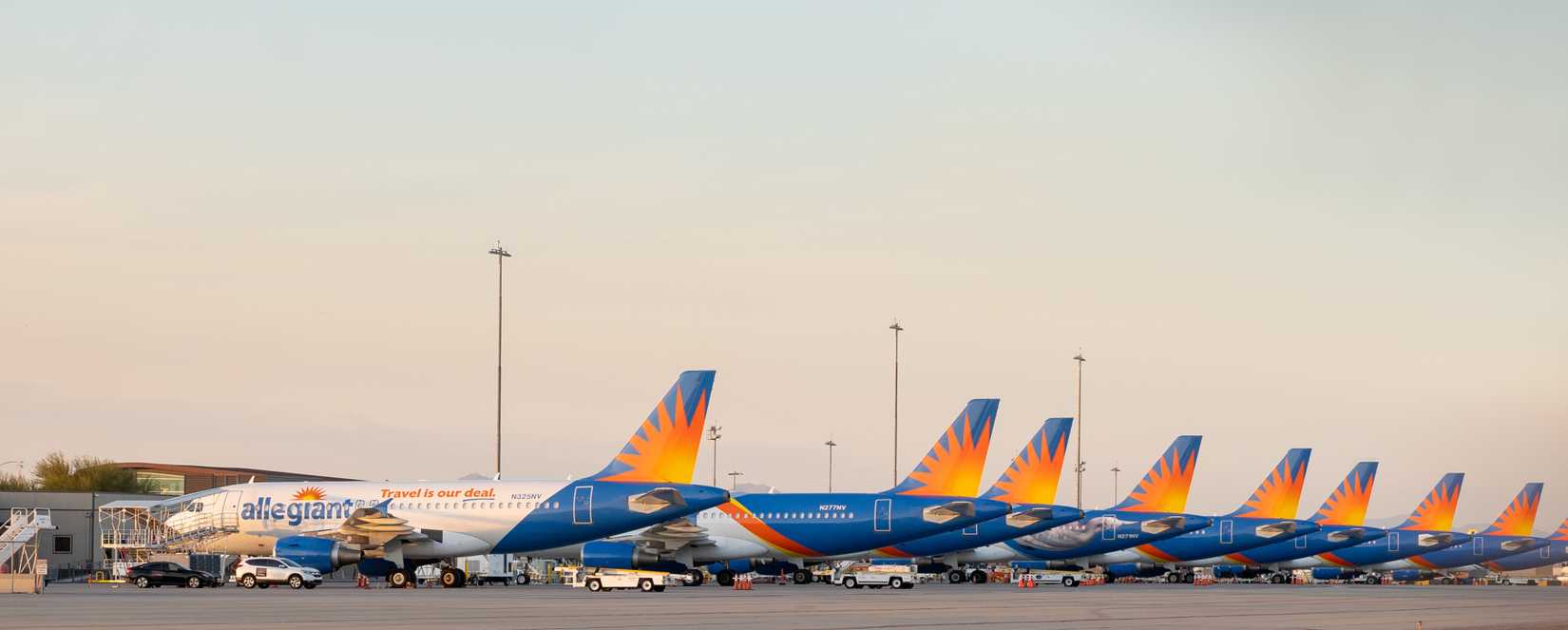 Allegiant jets lined up at the terminal