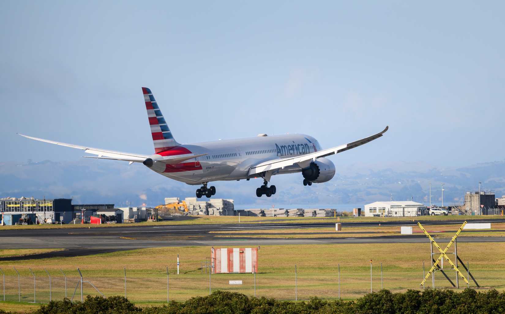 American Airlines Boeing 787-9 landing at AKL shutterstock_2592326839